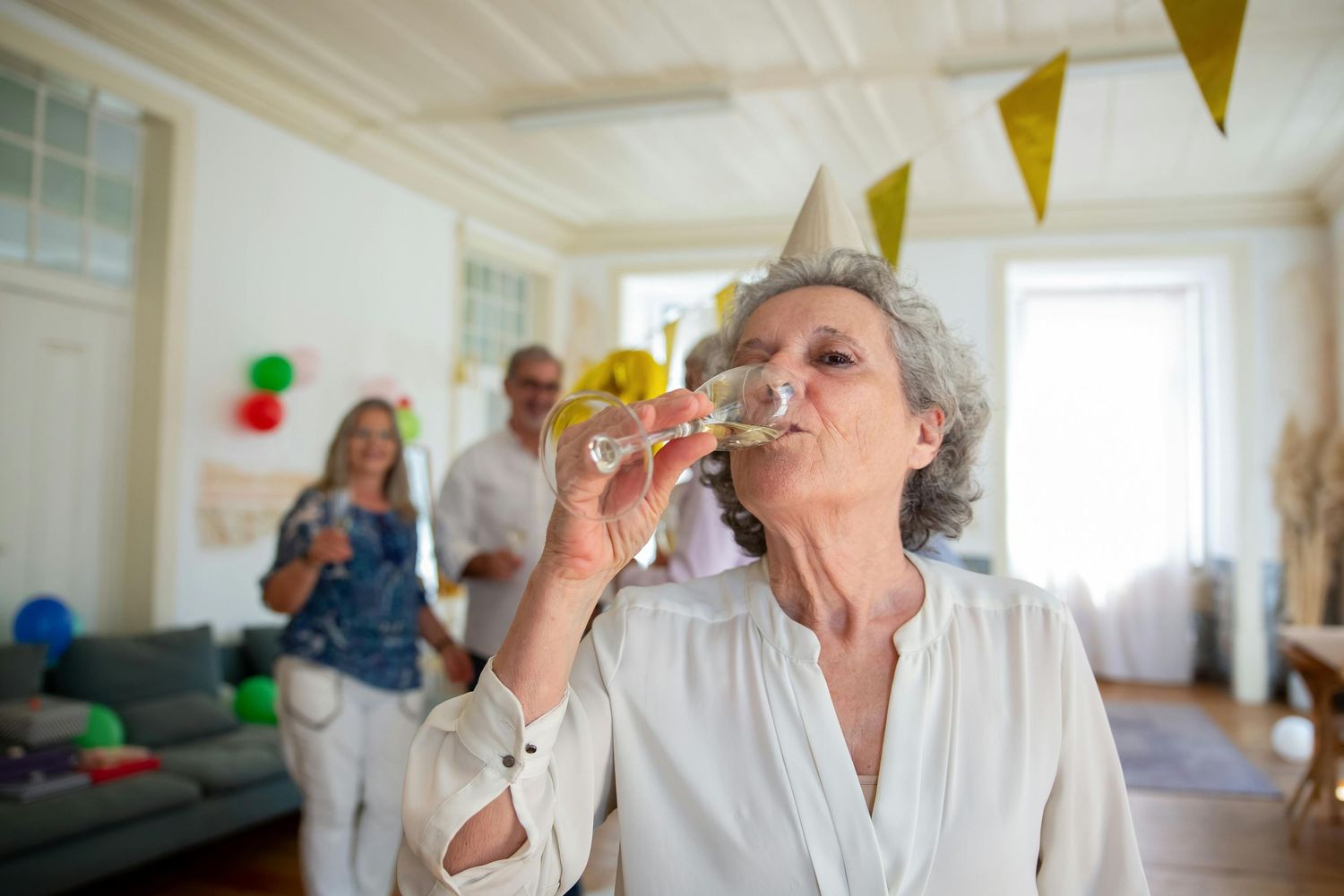 Award winning photographer Arizona. Bright party space with yellow triangle banners and celebratory decorations.