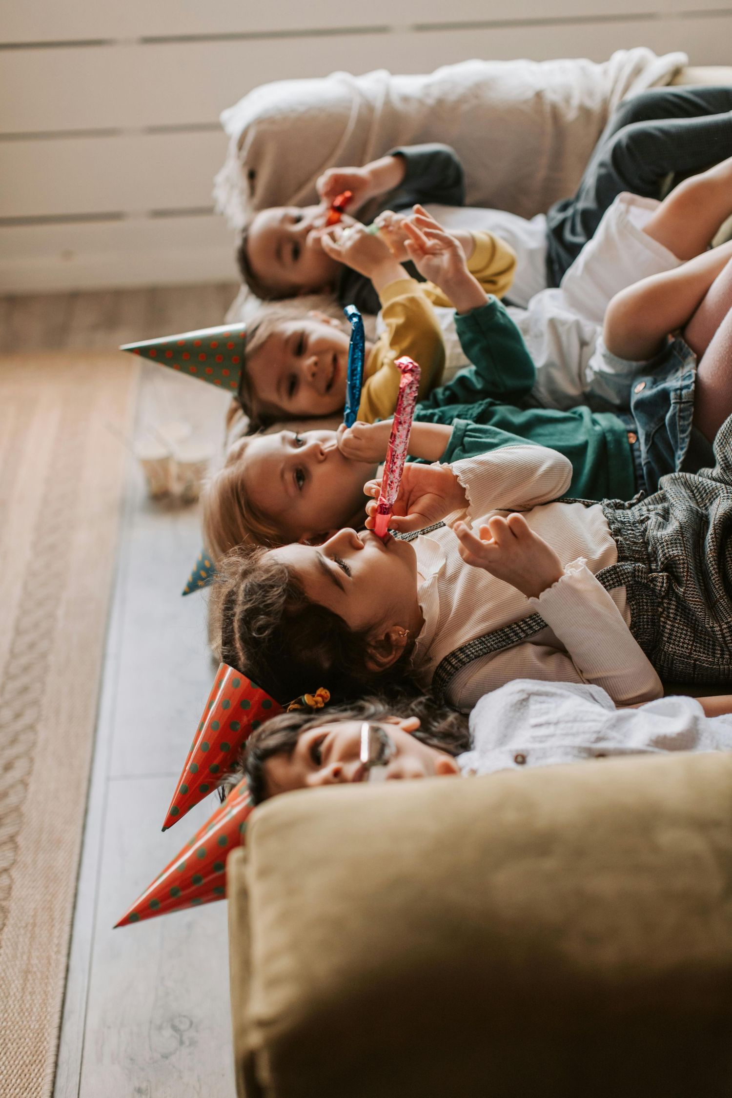 Maricopa birthday bash, kids enjoying games, playful smiles, photographed by a luxury Arizona children photographer.