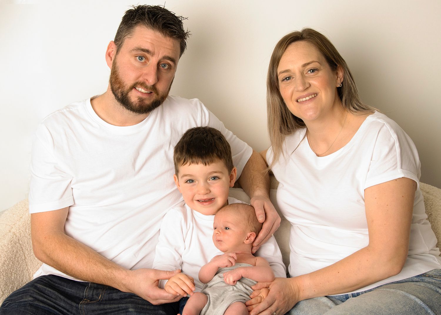 Family portrait with parents, toddler and newborn baby in Tower Co. Cork