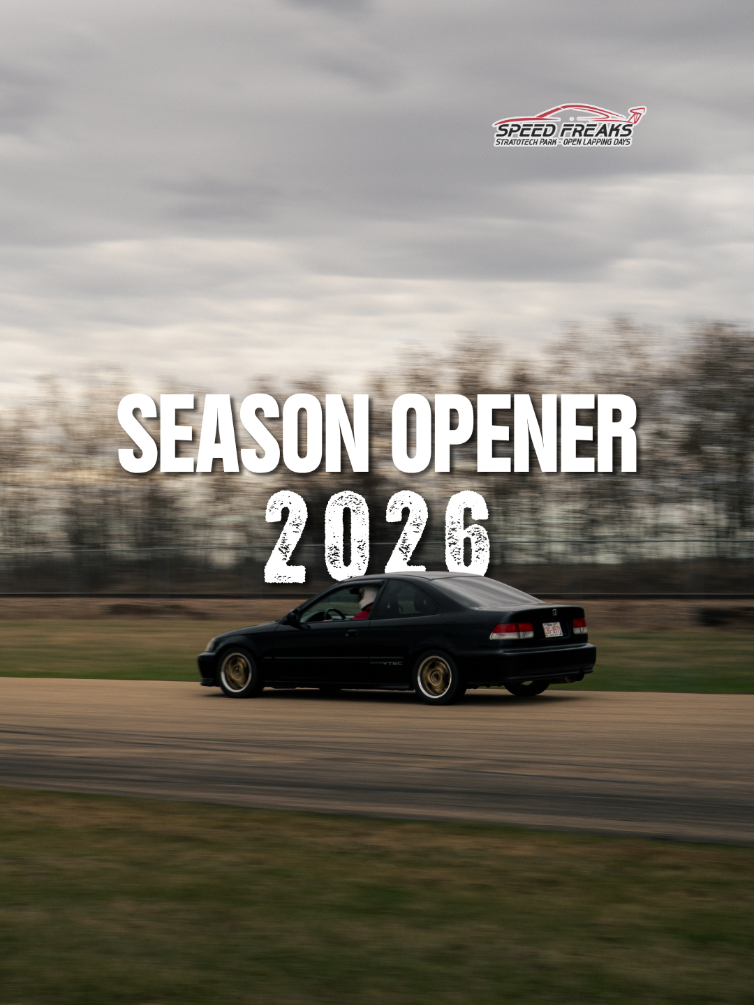 A black Honda Civic races on a track at the Speed Freaks Season Opener 2026 event under cloudy skies.