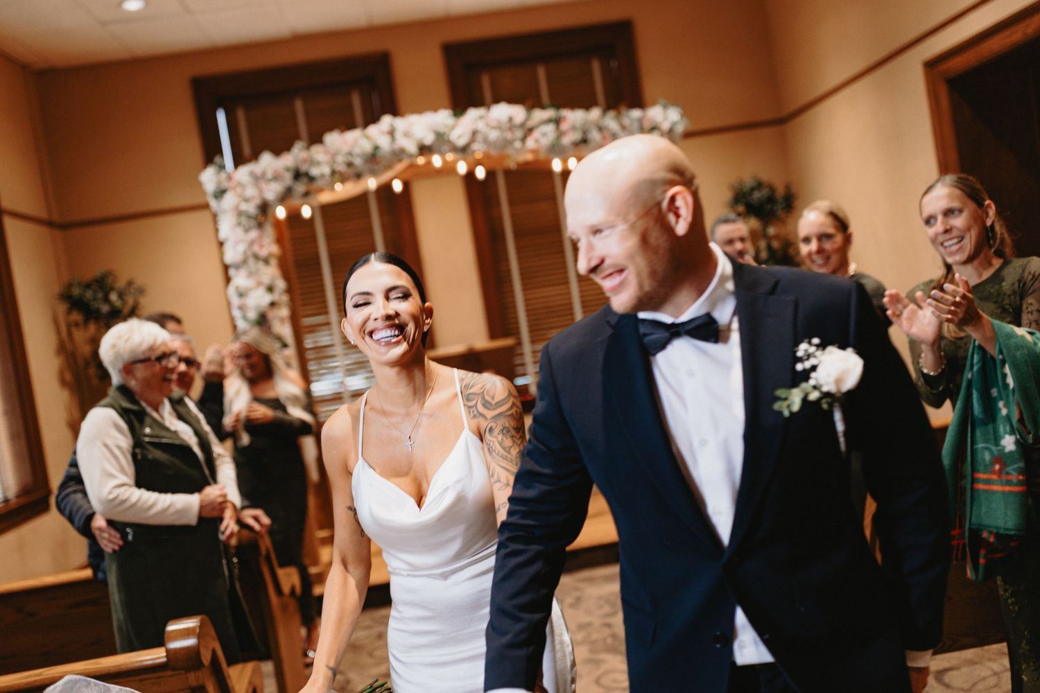 A series of wedding reception photos showing couples dancing and celebrating together at an elegant indoor venue.