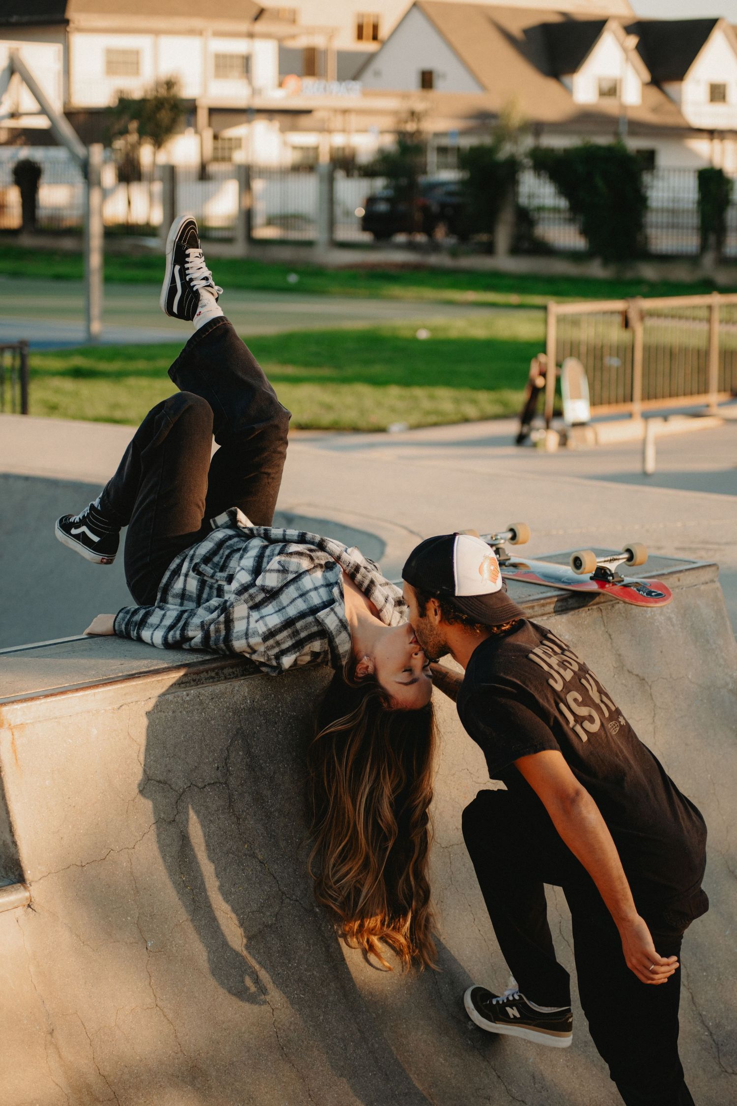 A sequence of skateboarding moves showing a person performing tricks on a concrete ramp at sunset.