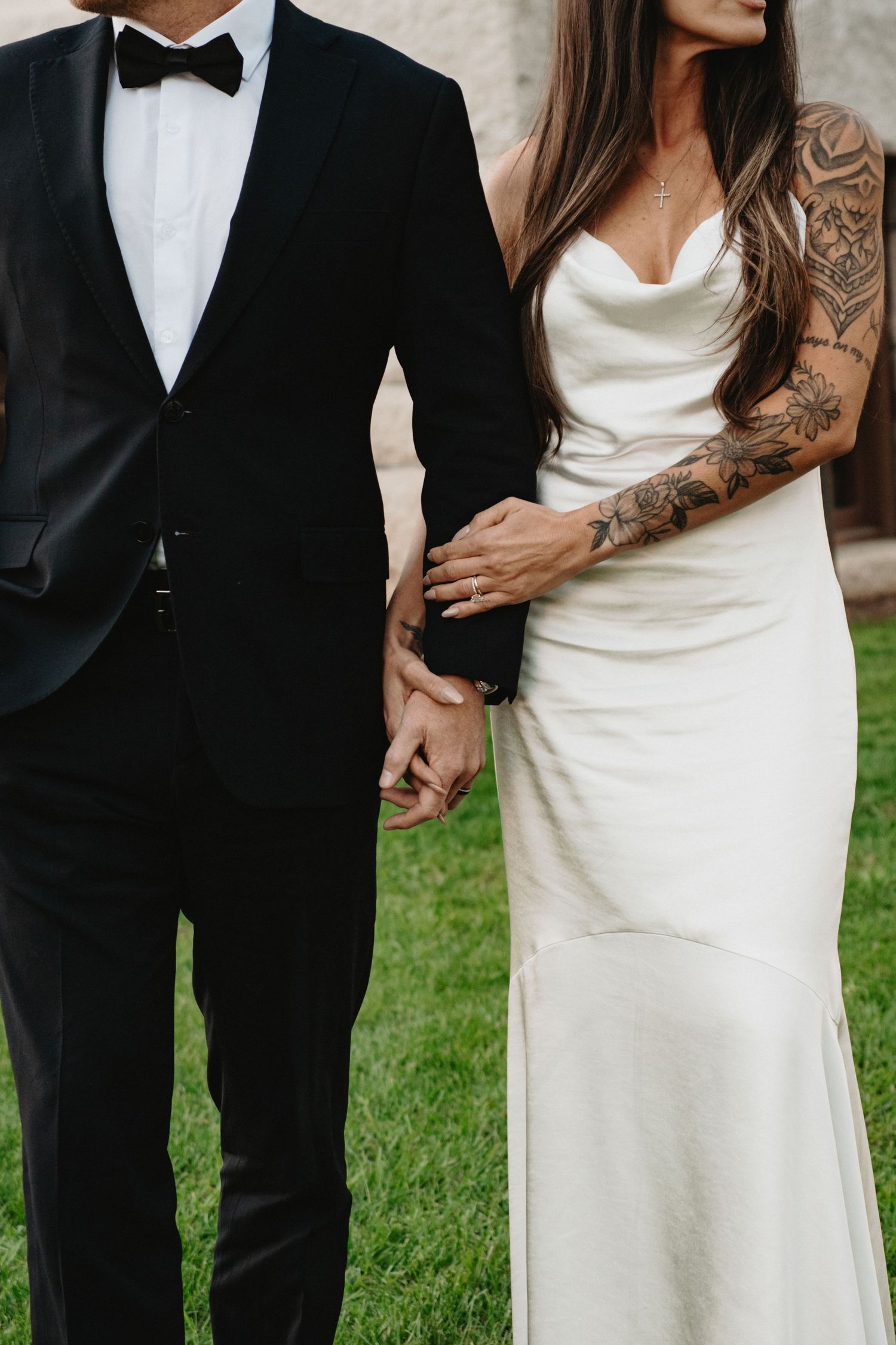 A series of wedding photos showing close-up details of a couple with the bride in white and groom in black tuxedo.