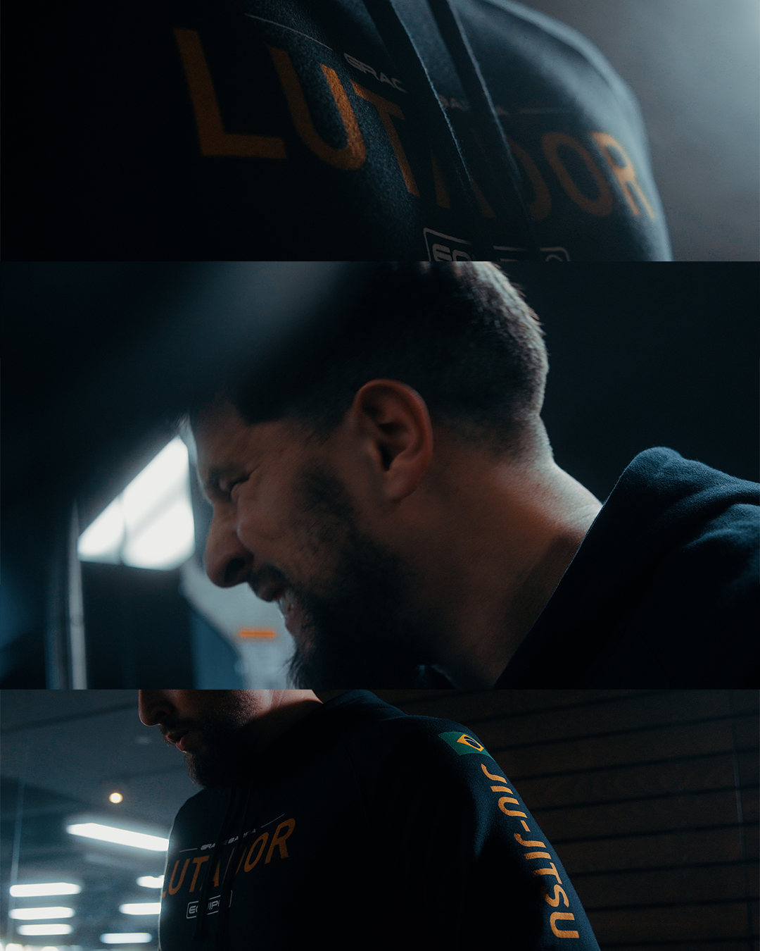 Profile view of person in dark hoodie in moody lighting.
