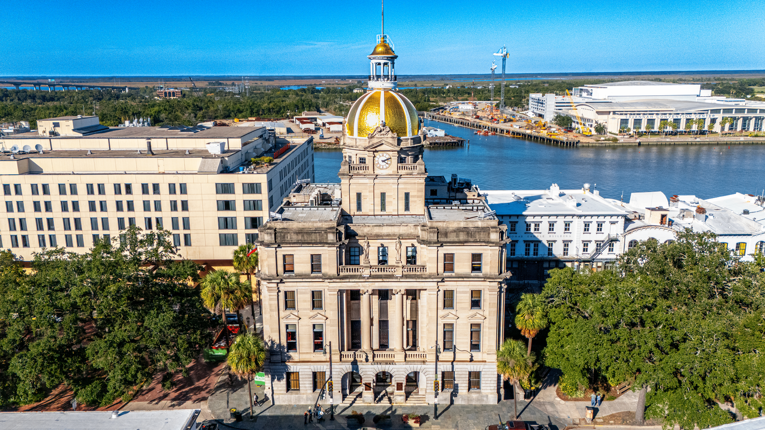 Aerial of Savannah, Georgia waterfront featuring historic downtown area at the Savannah courthouse architecture and harbor views.