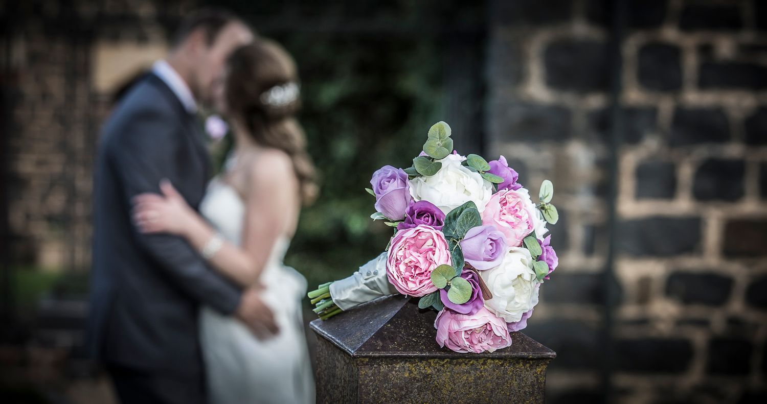 A romantic wedding photo collage featuring elegant floral bouquets, wedding attire, and candid moments in outdoor settings.