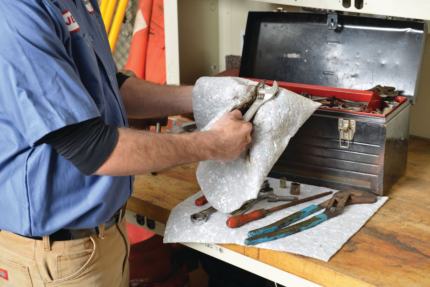 A series of photos showing someone using tools to repair and install electronics on a wooden workbench.
