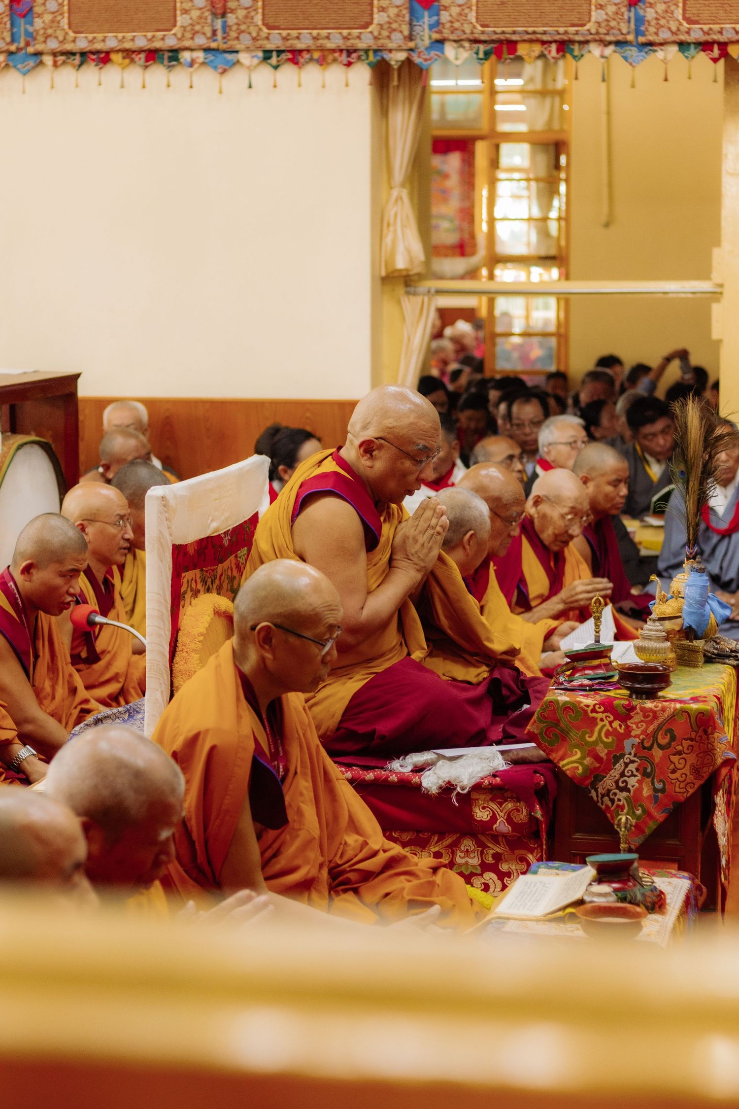 a buddhist monk at the Dalai Lama's 85th birthday celebration in Dharamsala, India