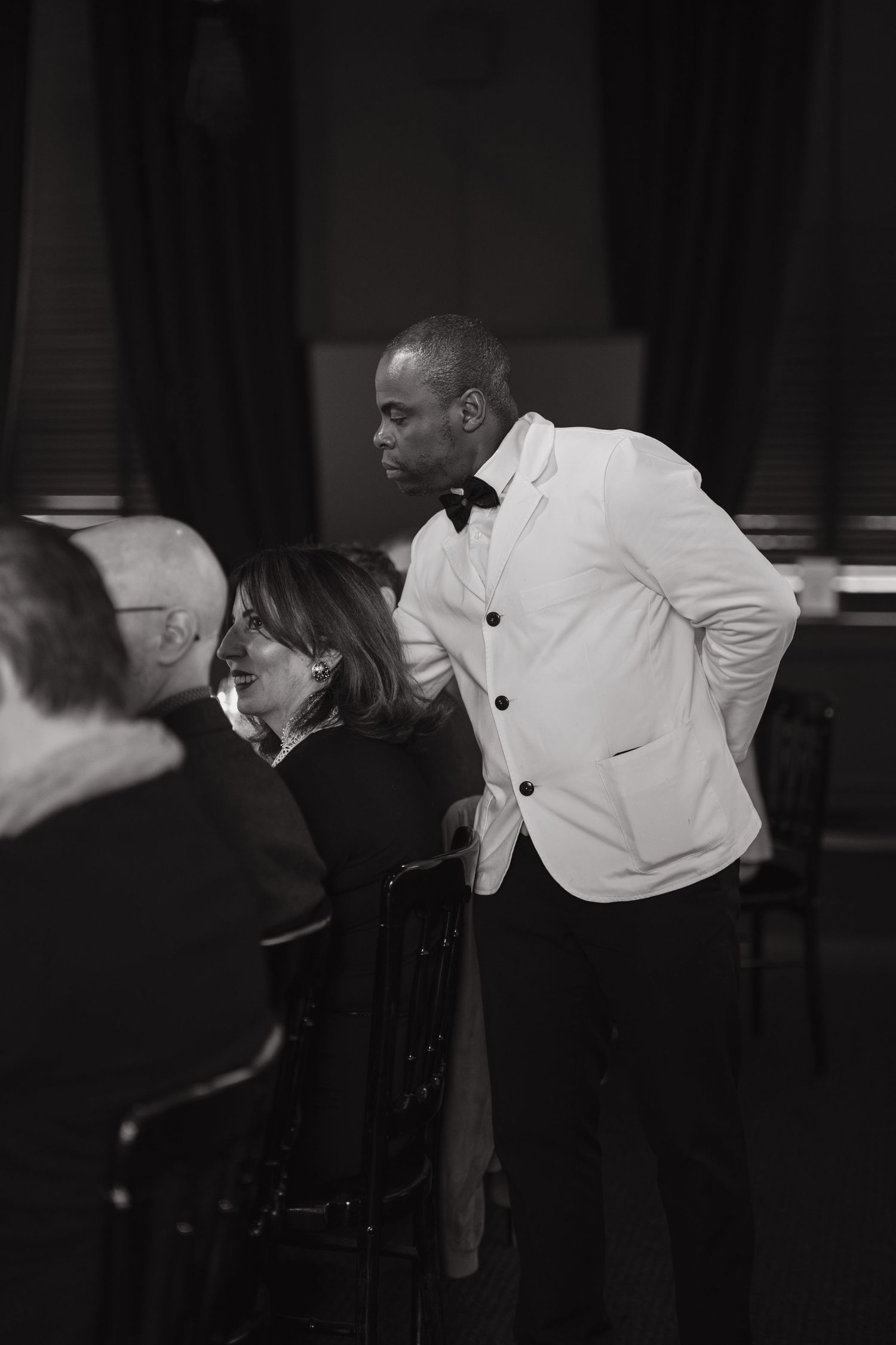 Waiters bringing food to guests