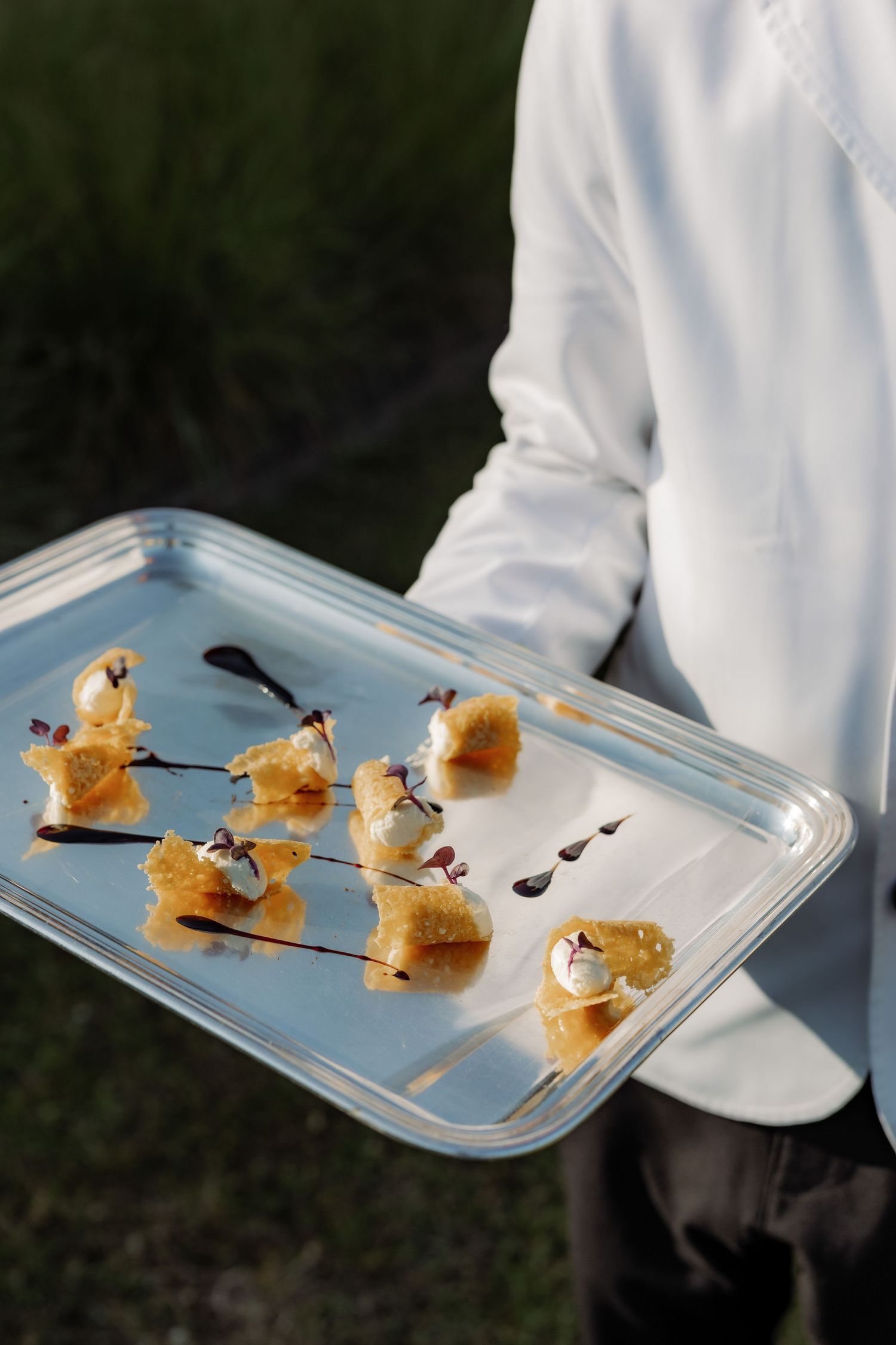 Plate of food brought by a waiter