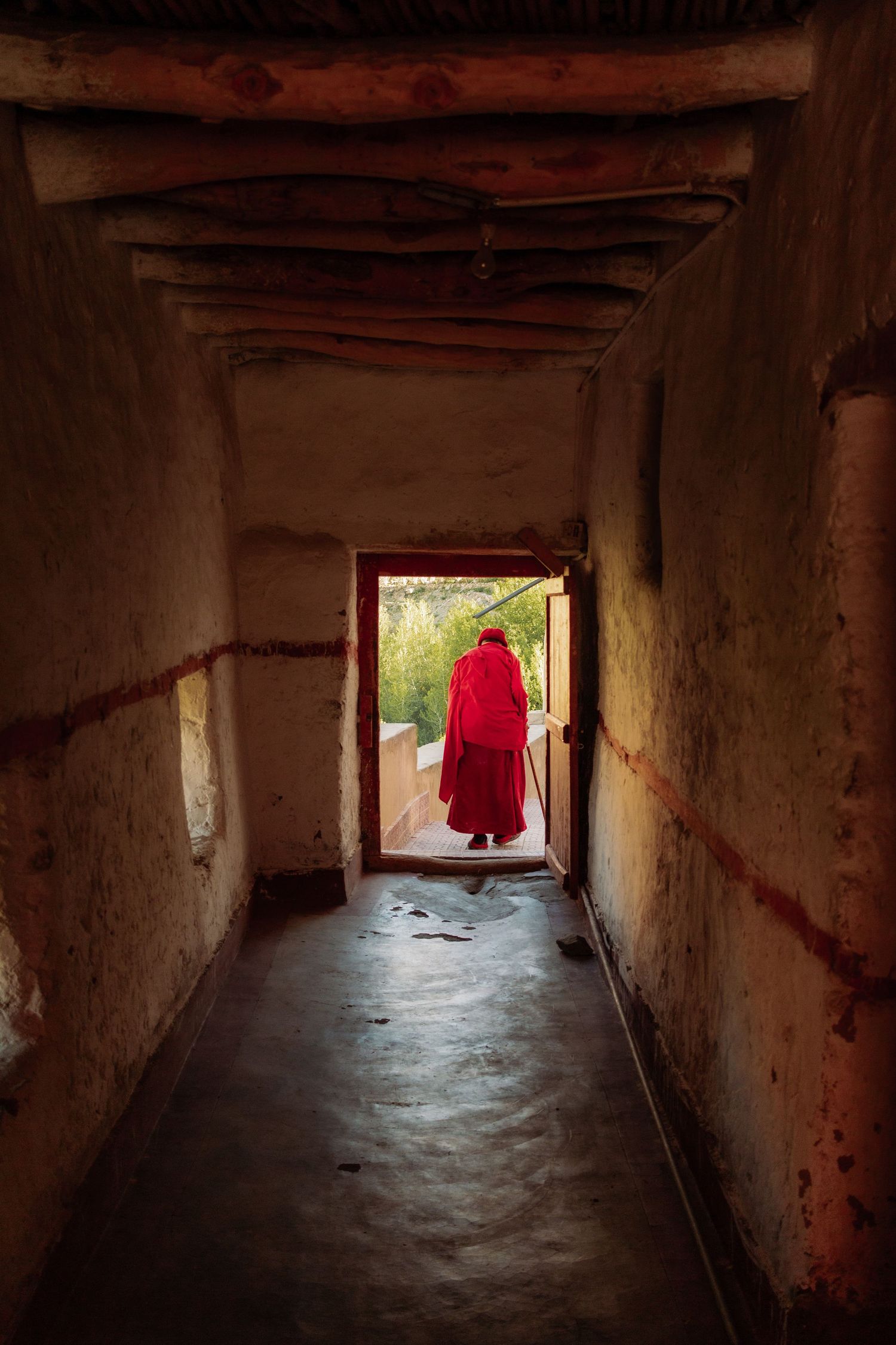 A monk leaves the temple in Ladakh