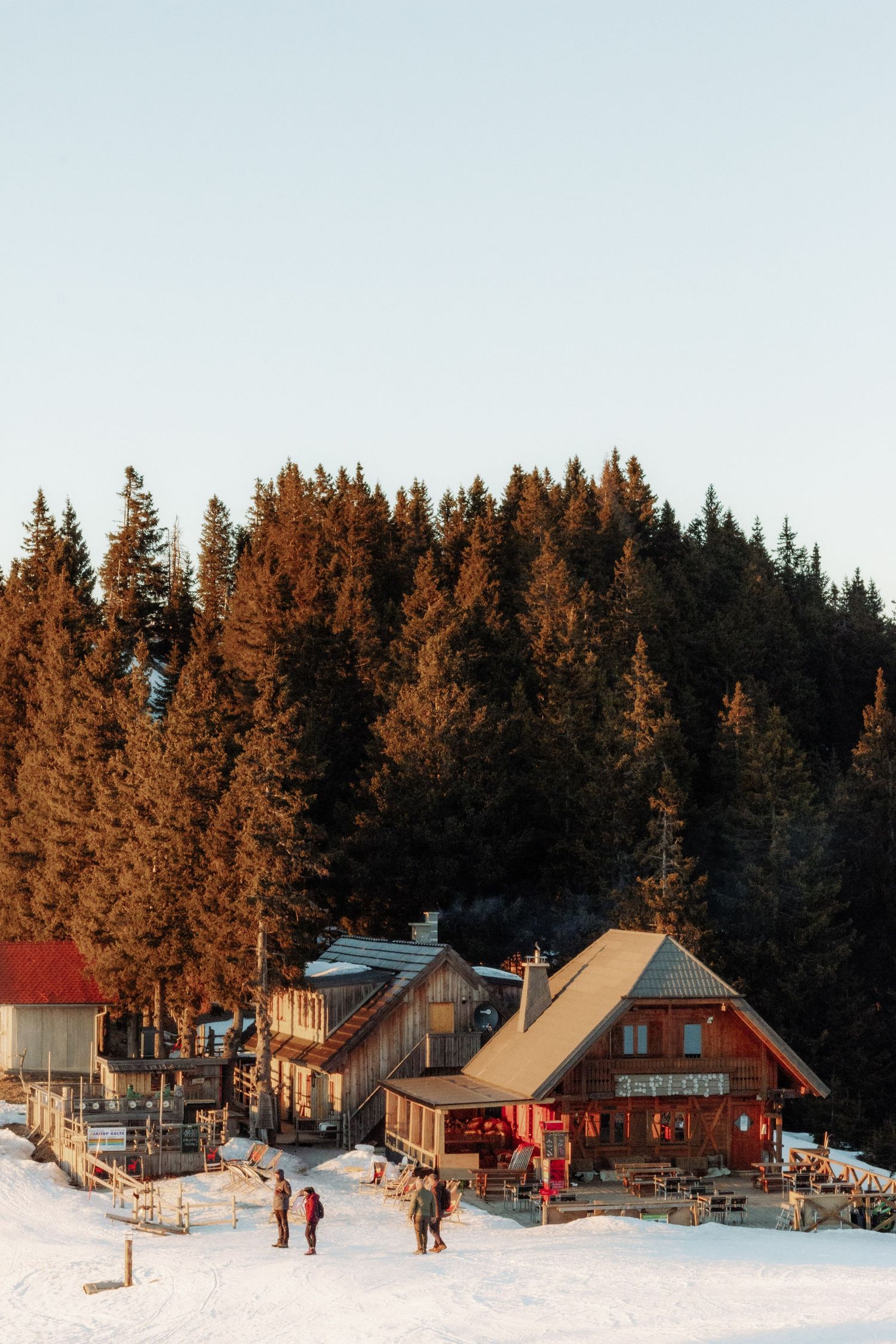 View of a cabin at sunset in the mountains in Slovenia