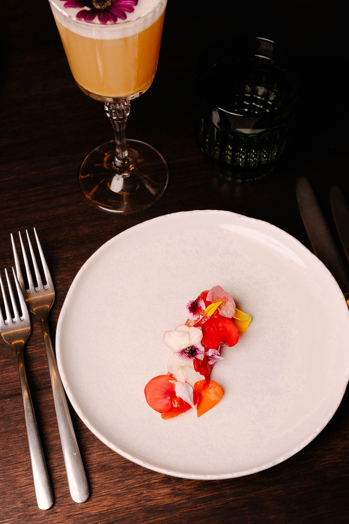 A picture of a starter with a glass of wine