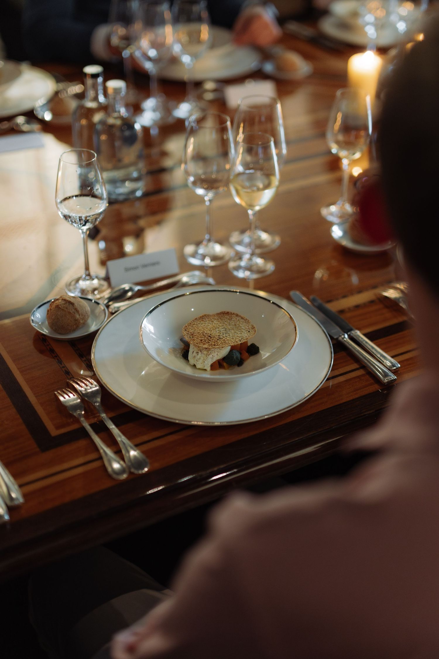 Waiters bringing food to guests