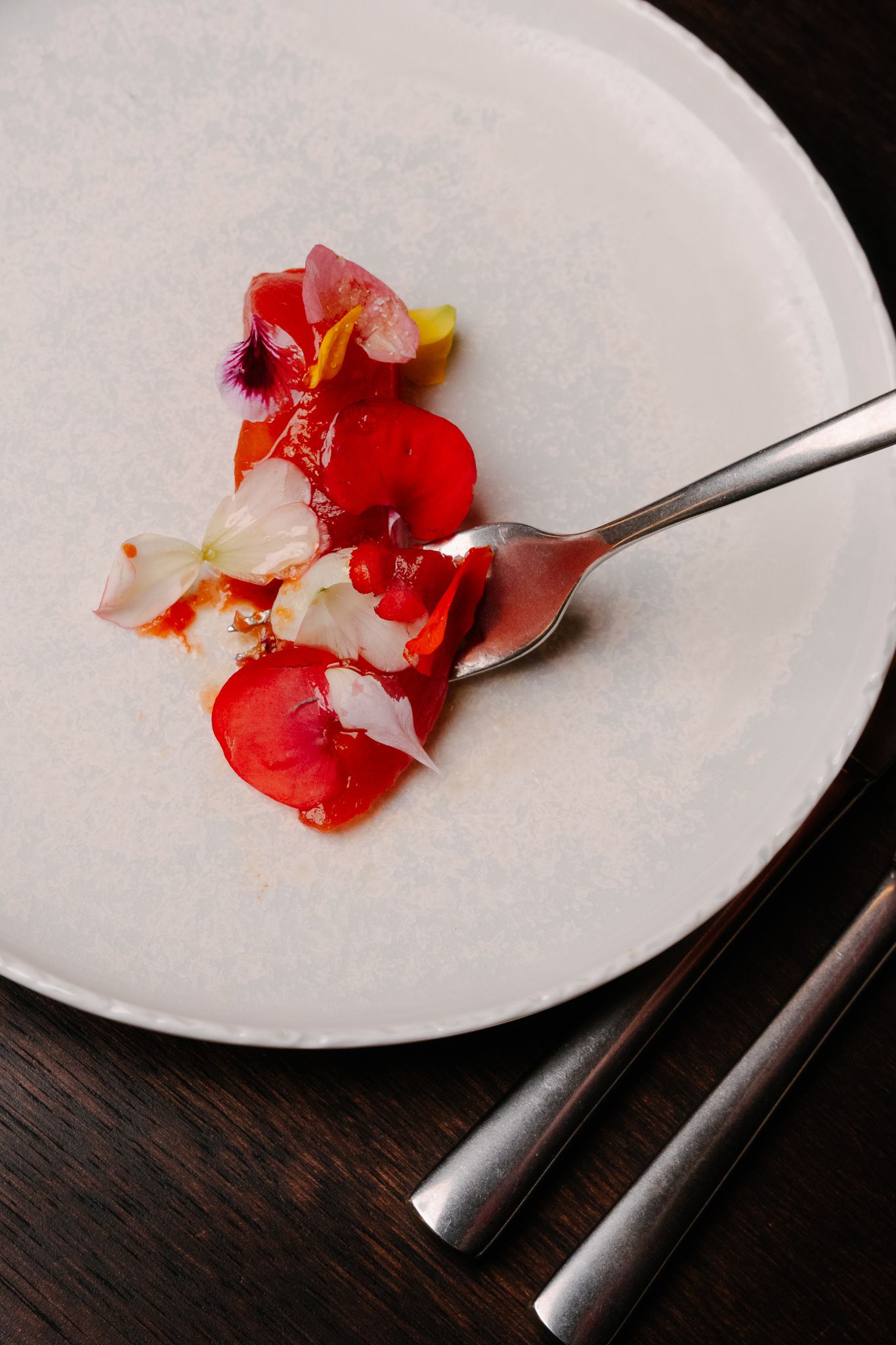 Someone is taking a bite of a starter