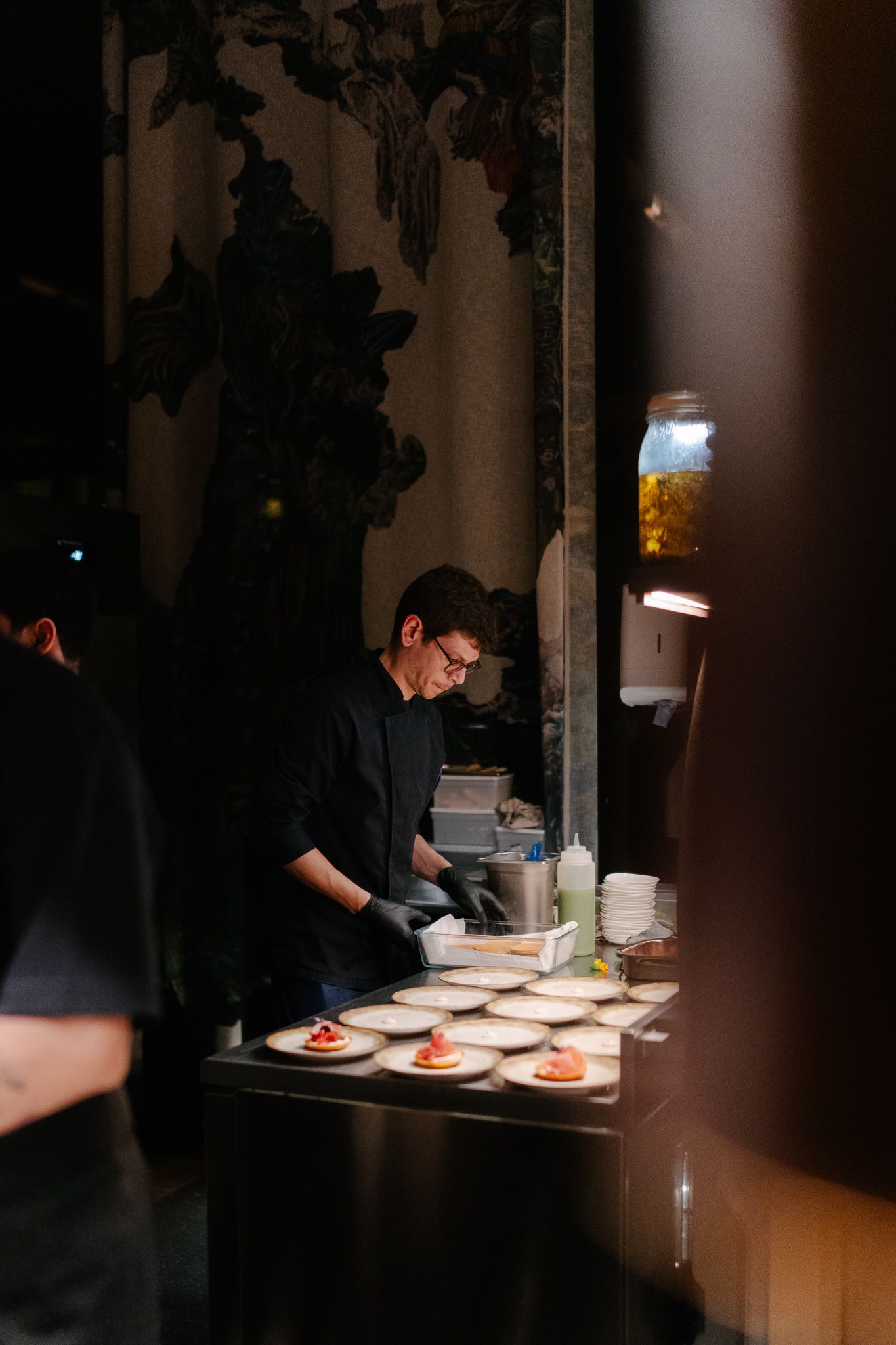 A chef cooking in his kitchen