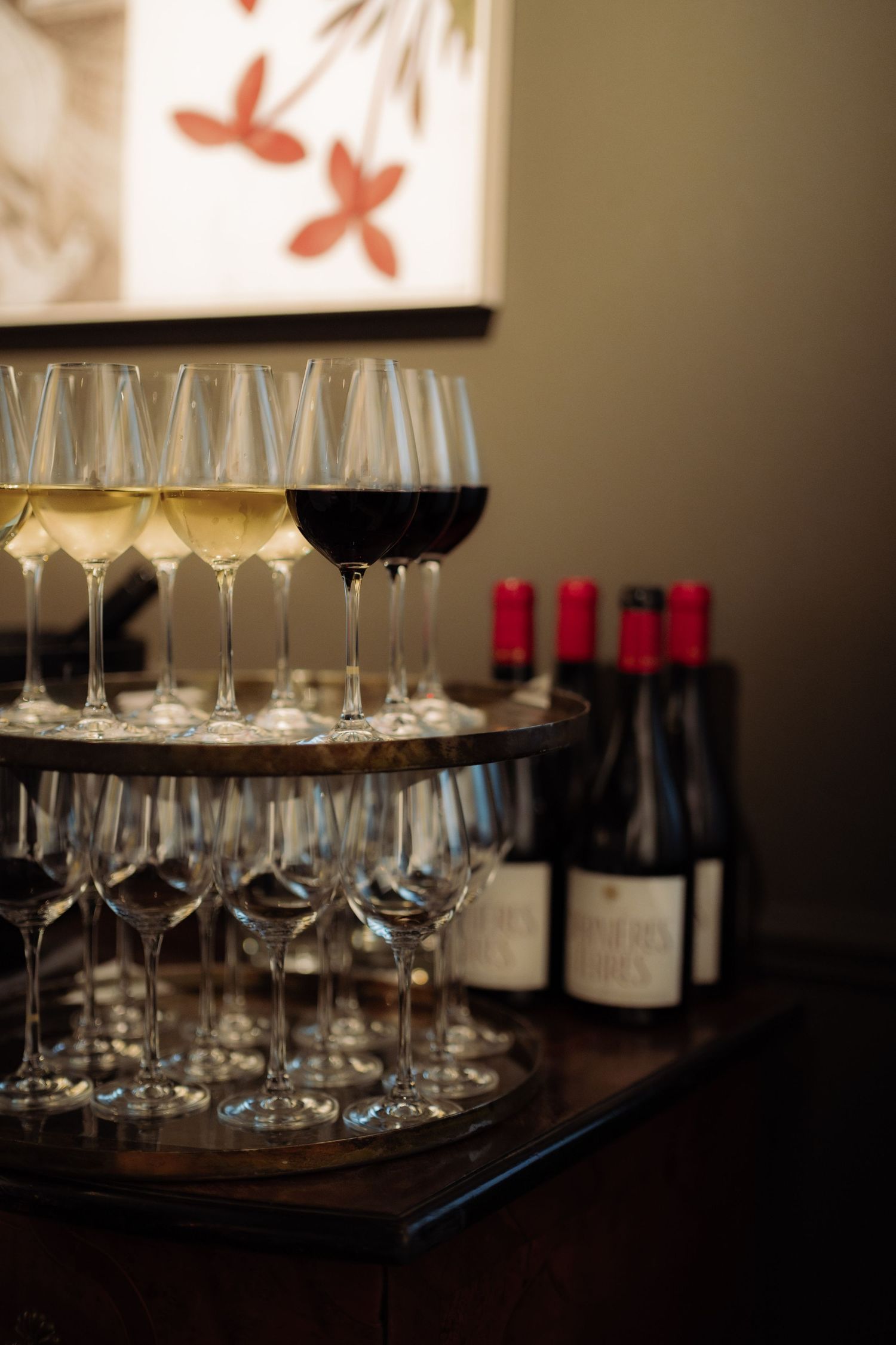 A tray of wine glasses waiting for guests to enjoy them