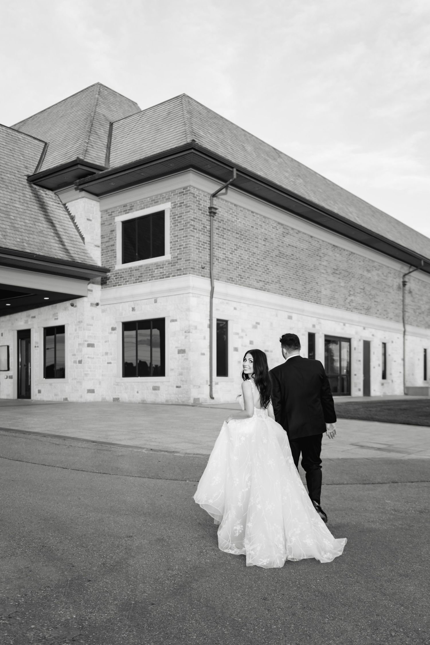 black-and-white Candid wedding portraits of a bride and groom at Arlington Estate, photographed by a Toronto wedding photographer.