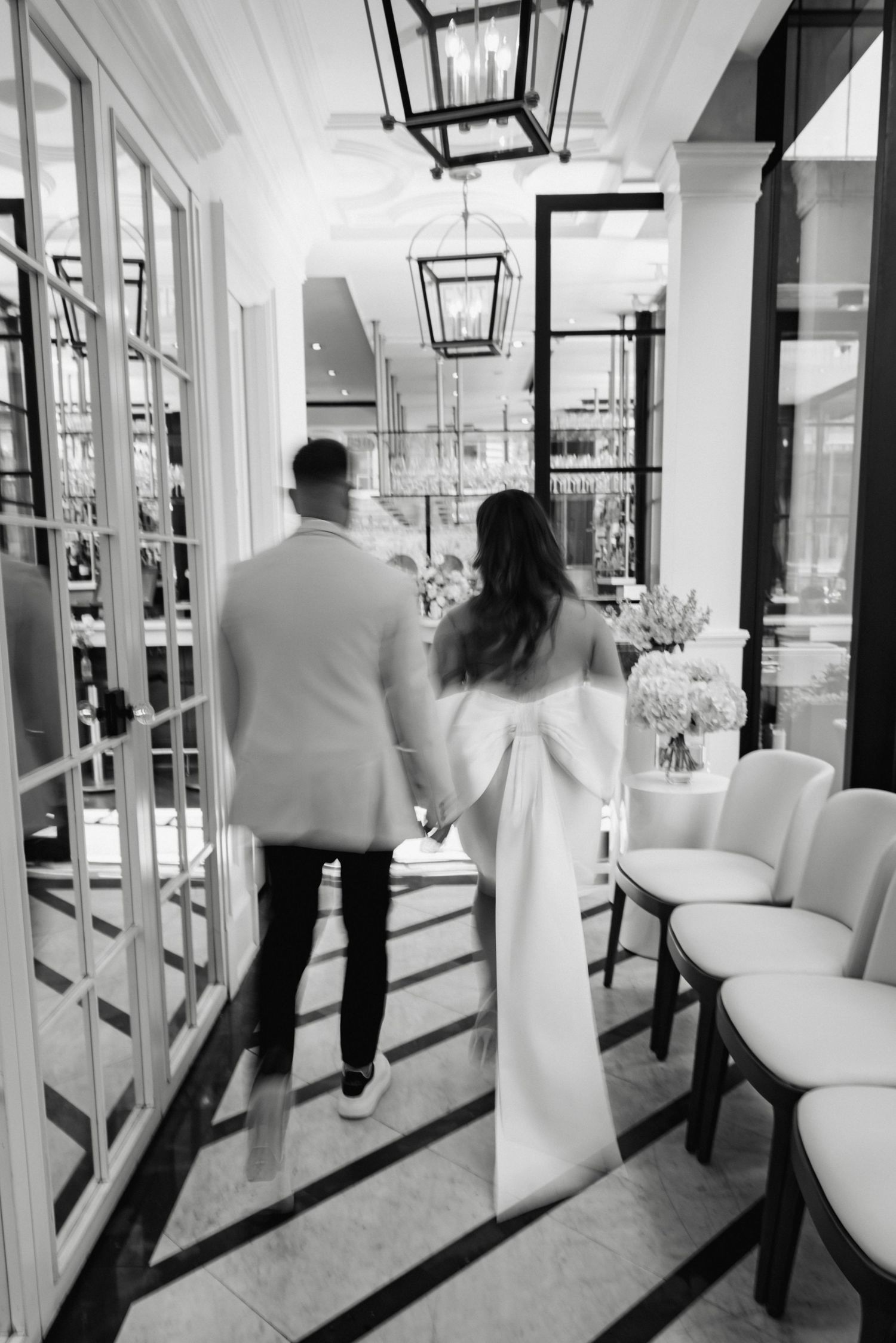 Photographed in a Black-and-white blurry photo, a couple at a bridal shower at The Chase in downtown Toronto