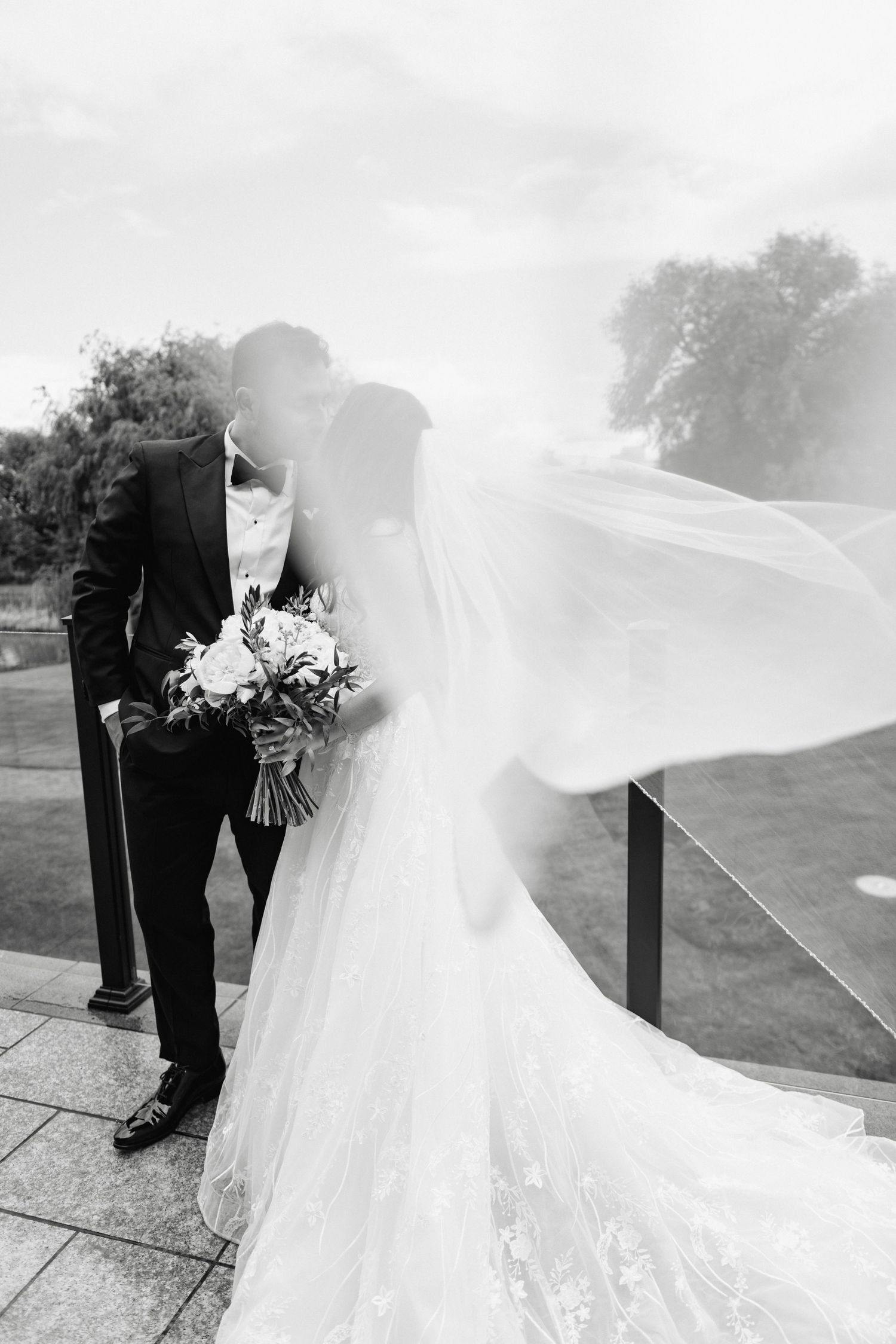 black-and-white Candid wedding portraits of a bride and groom at Arlington Estate, photographed by a Toronto wedding photographer.