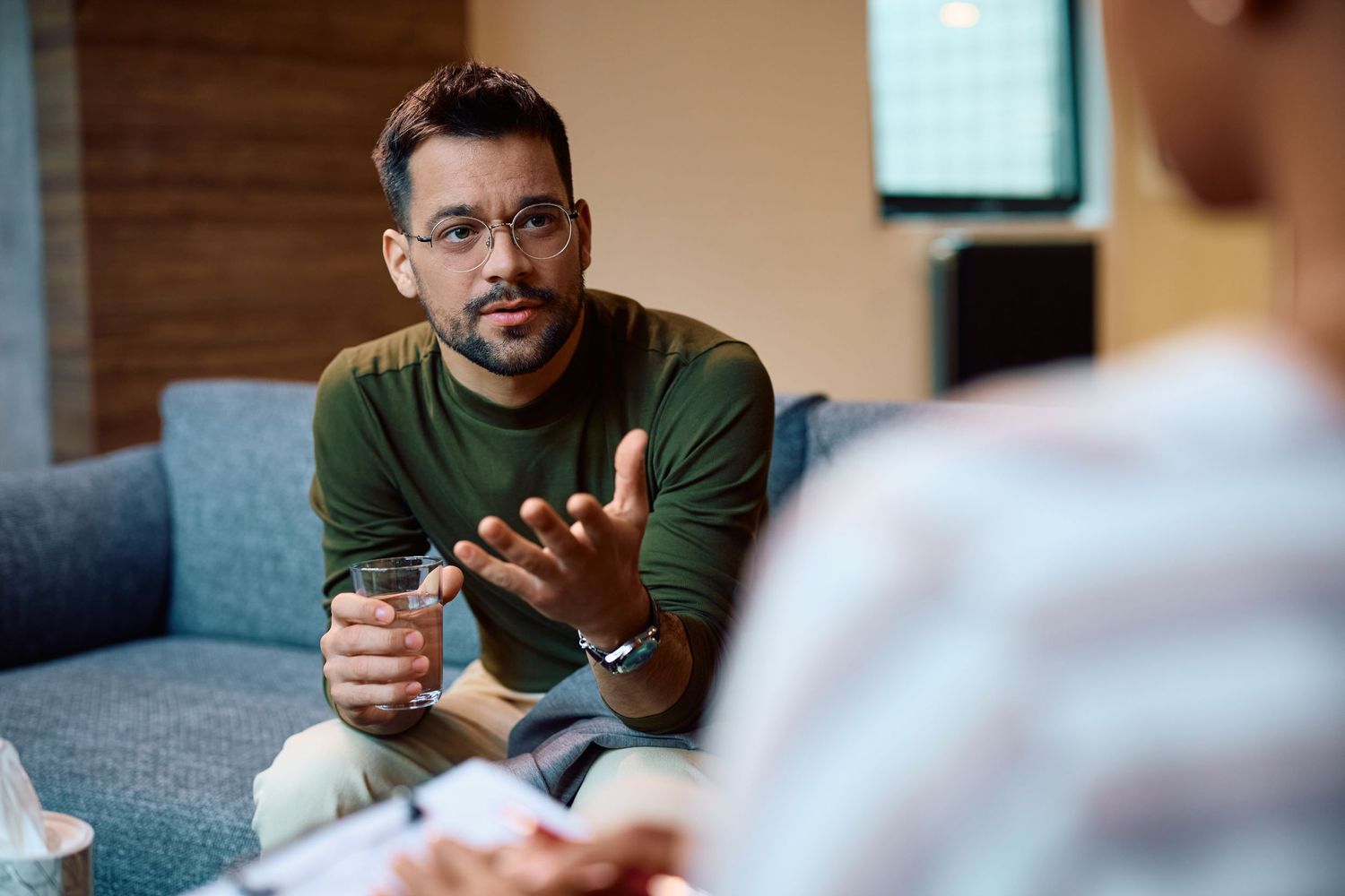 Man talking with a therapist