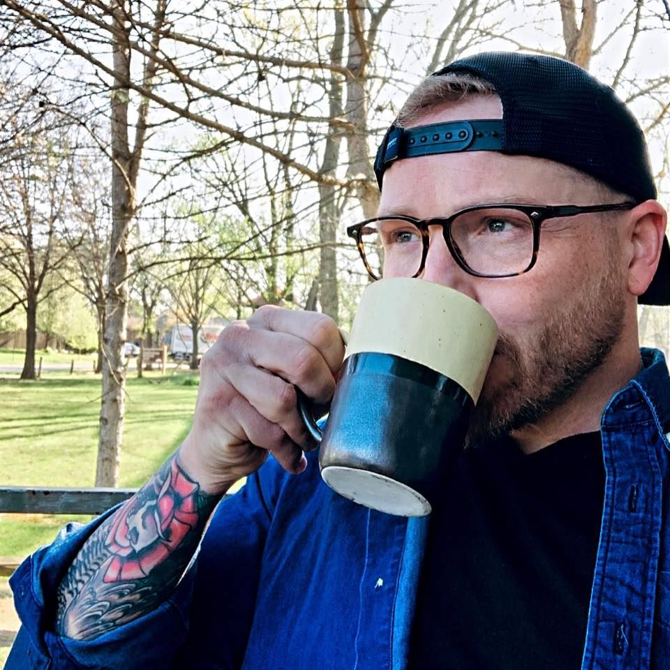man drinking coffee