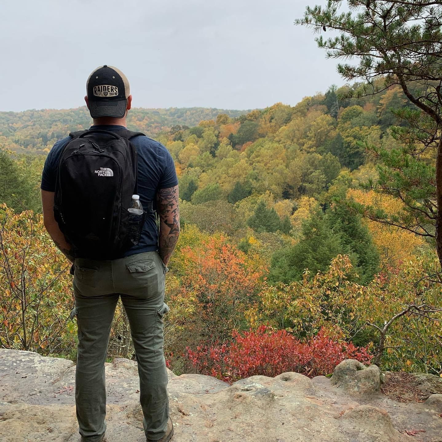 man standing on a mountain