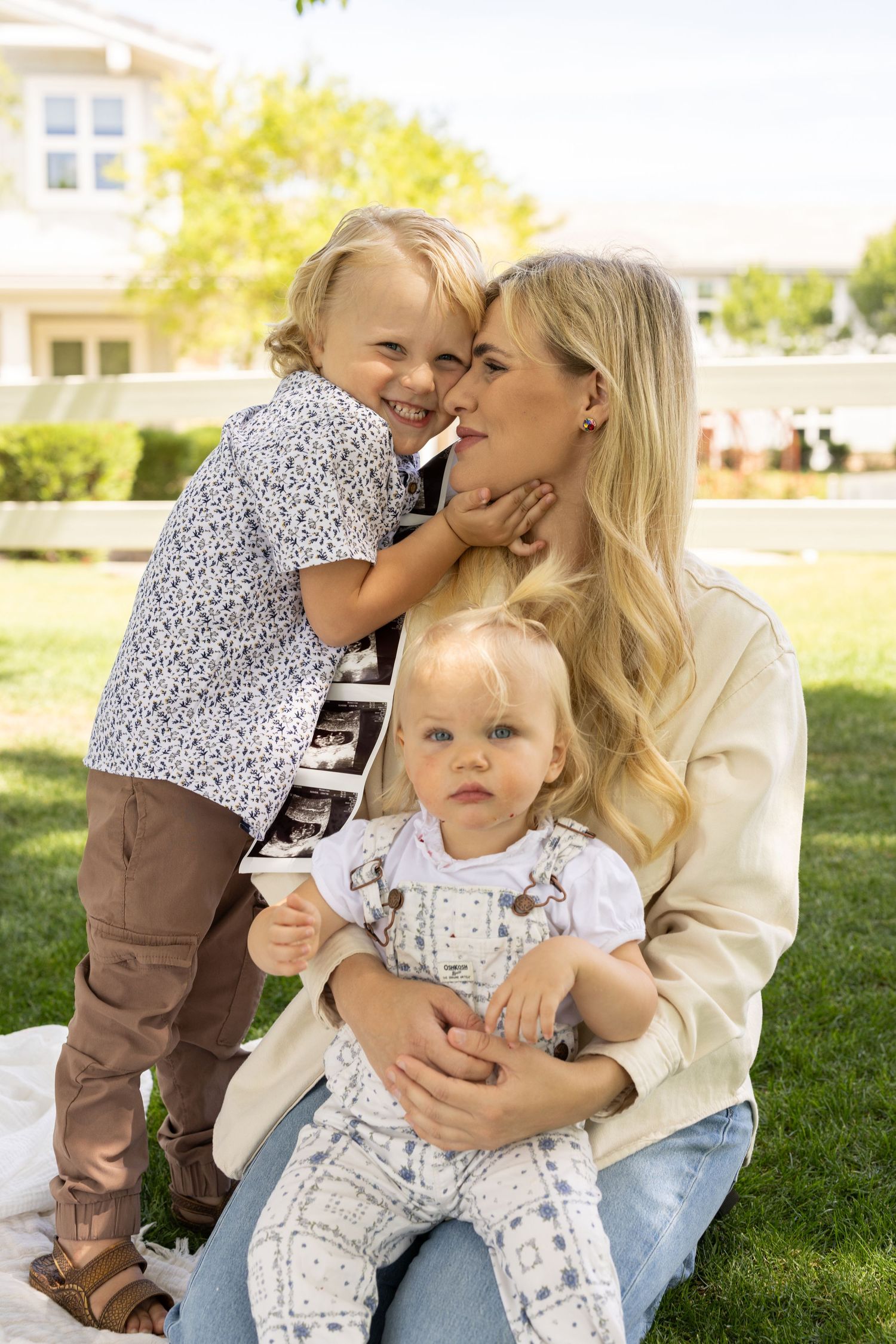family session and baby announcement photoshoot in Gilbert, AZ, park and Lakeview by four silos in Morrison ranch.
