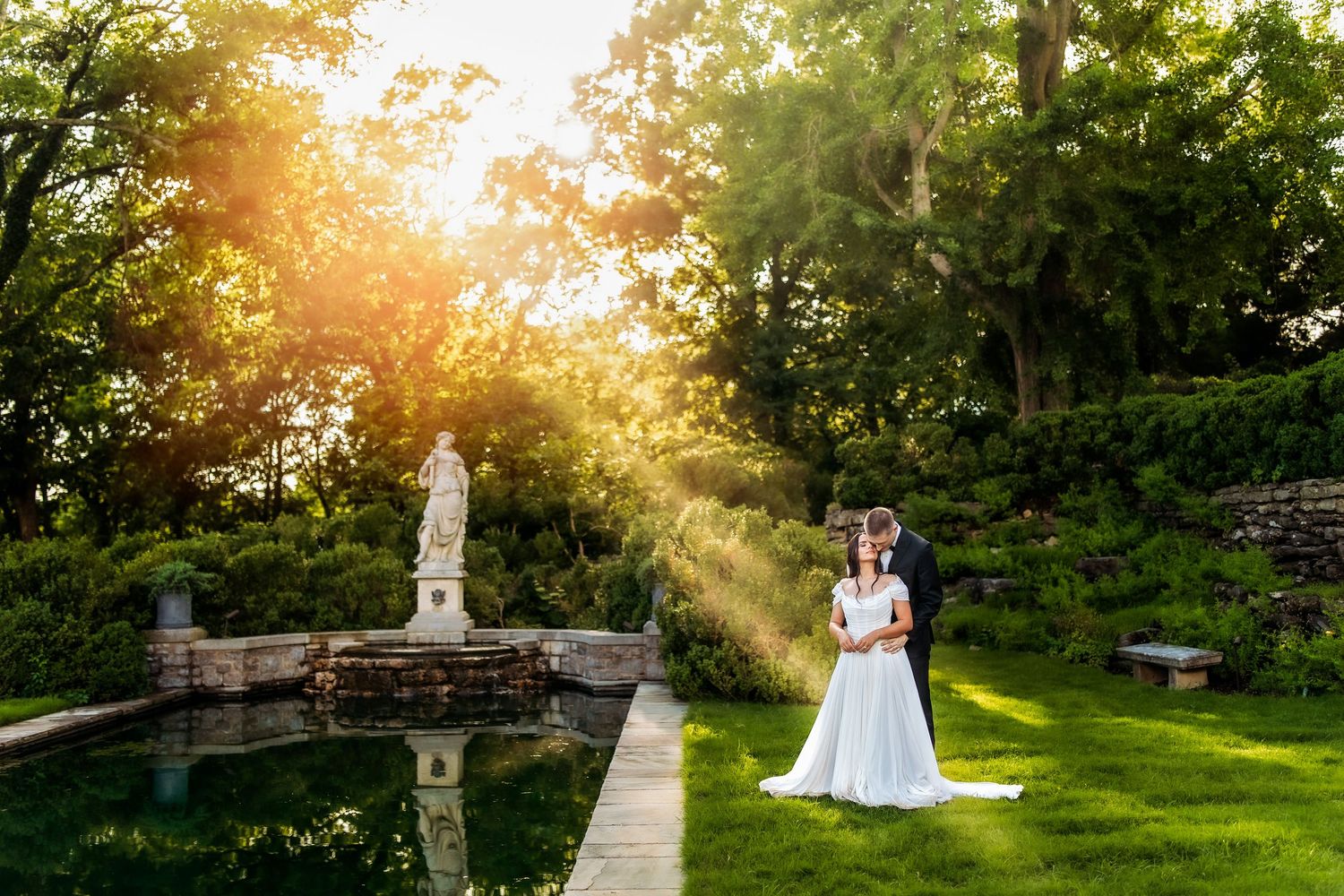 Colorado wedding photography at golden hour in front of reflecting pool, botanical garden wedding photography, Denver wedding photography