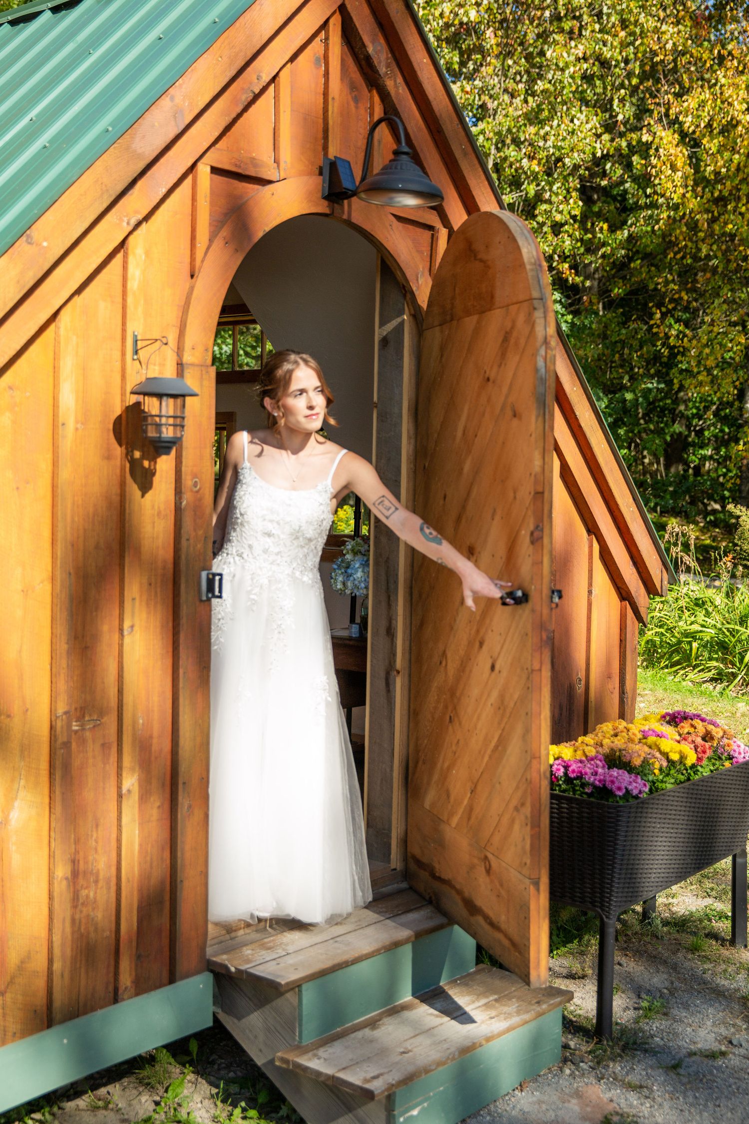 Bride in doorway of bridal suite at Coldspring Farm
