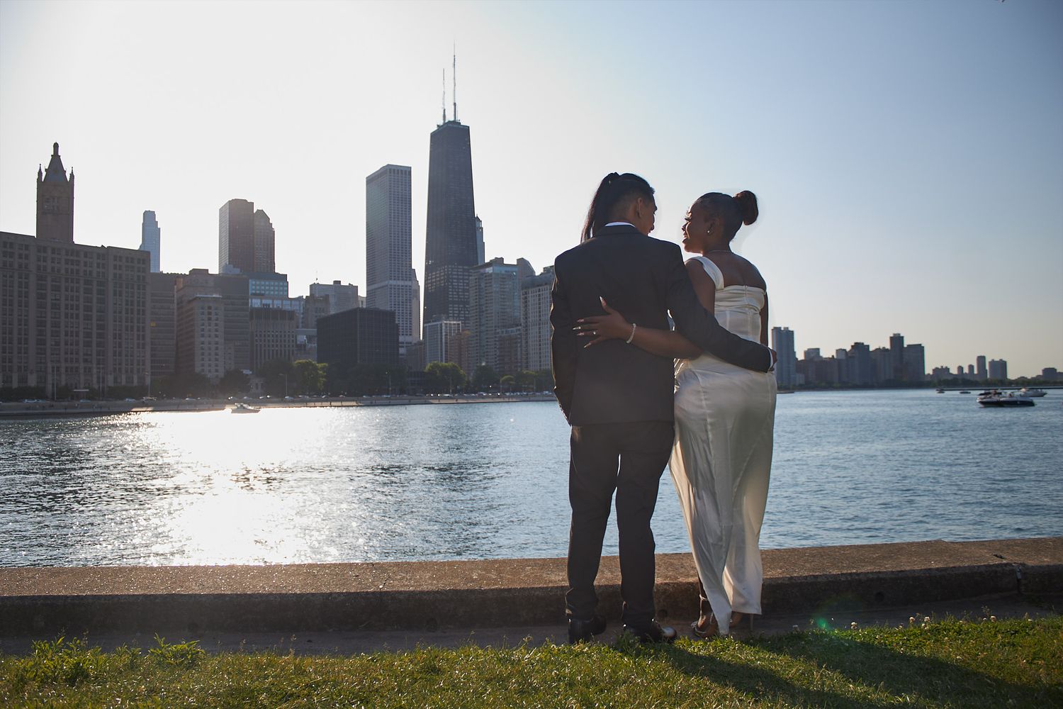 Married couple looking at Chicago silhouette