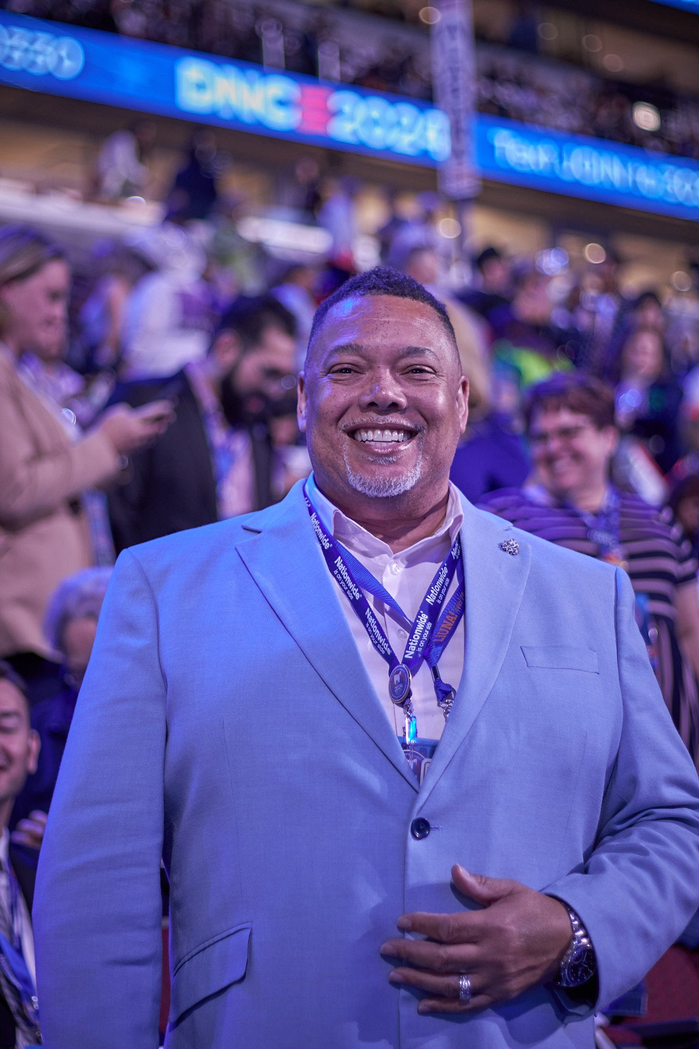 Man in suit posing at the 2020 DNC