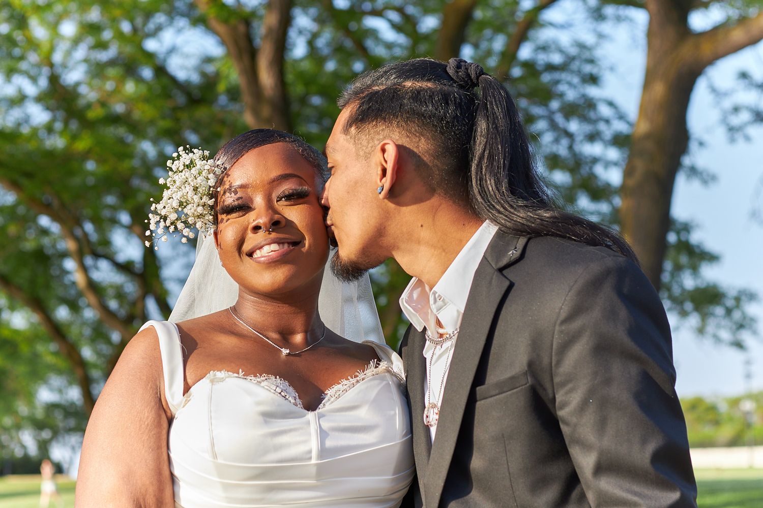 Groom kissing bride