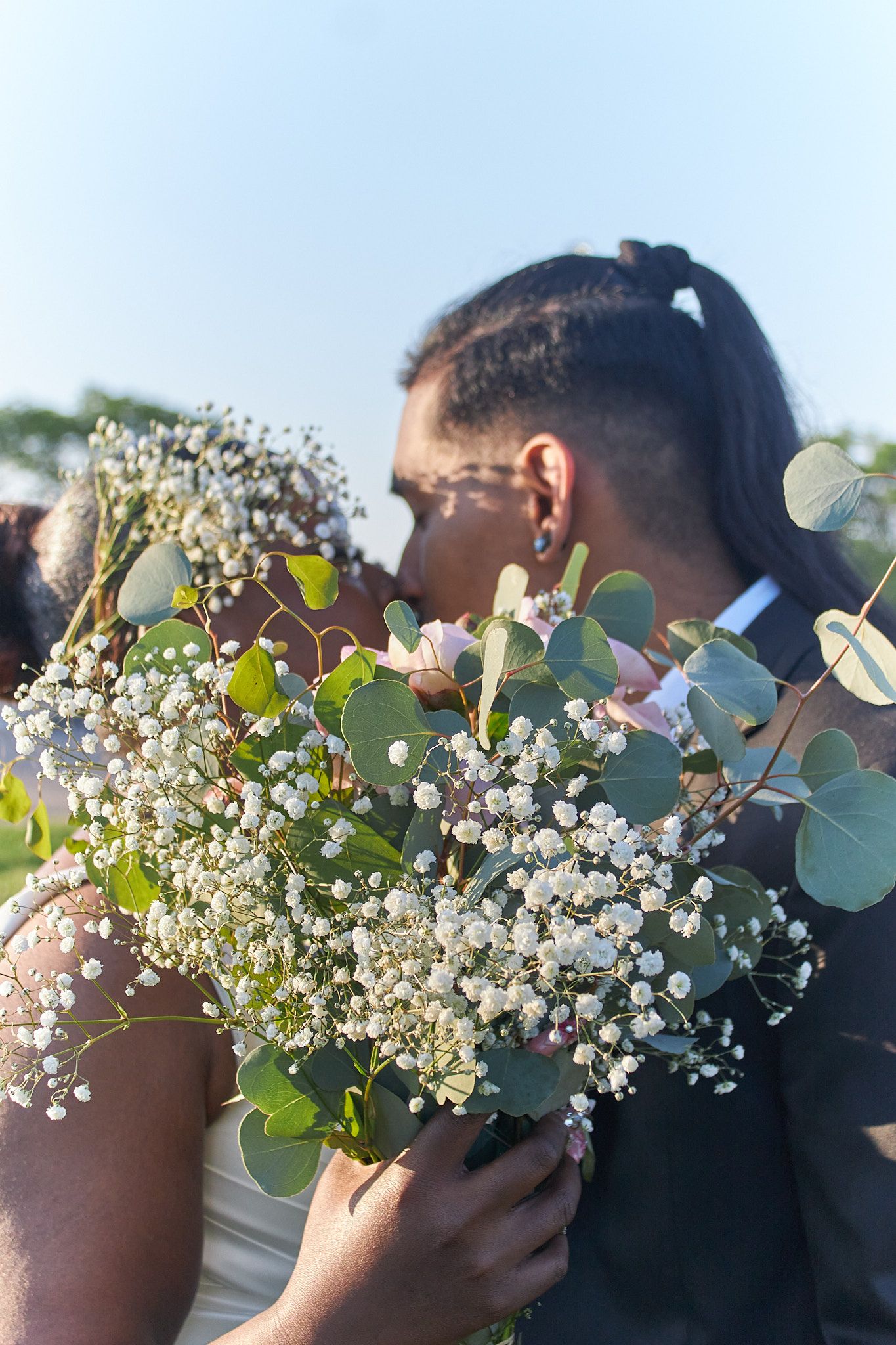 Married couple kissing