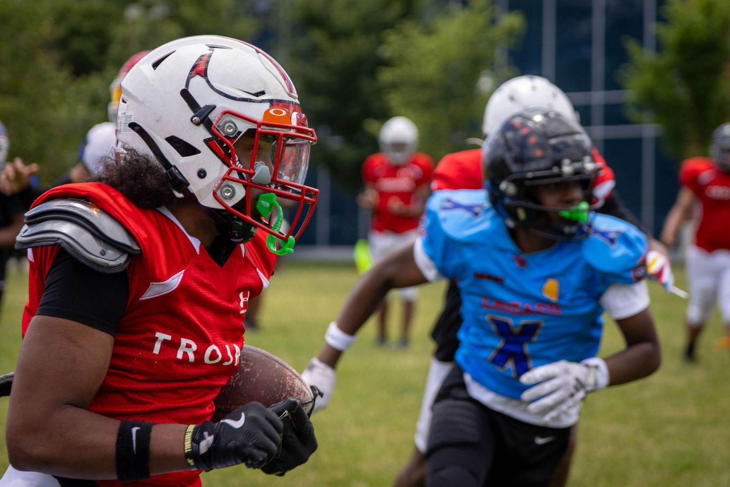 Running back running with football