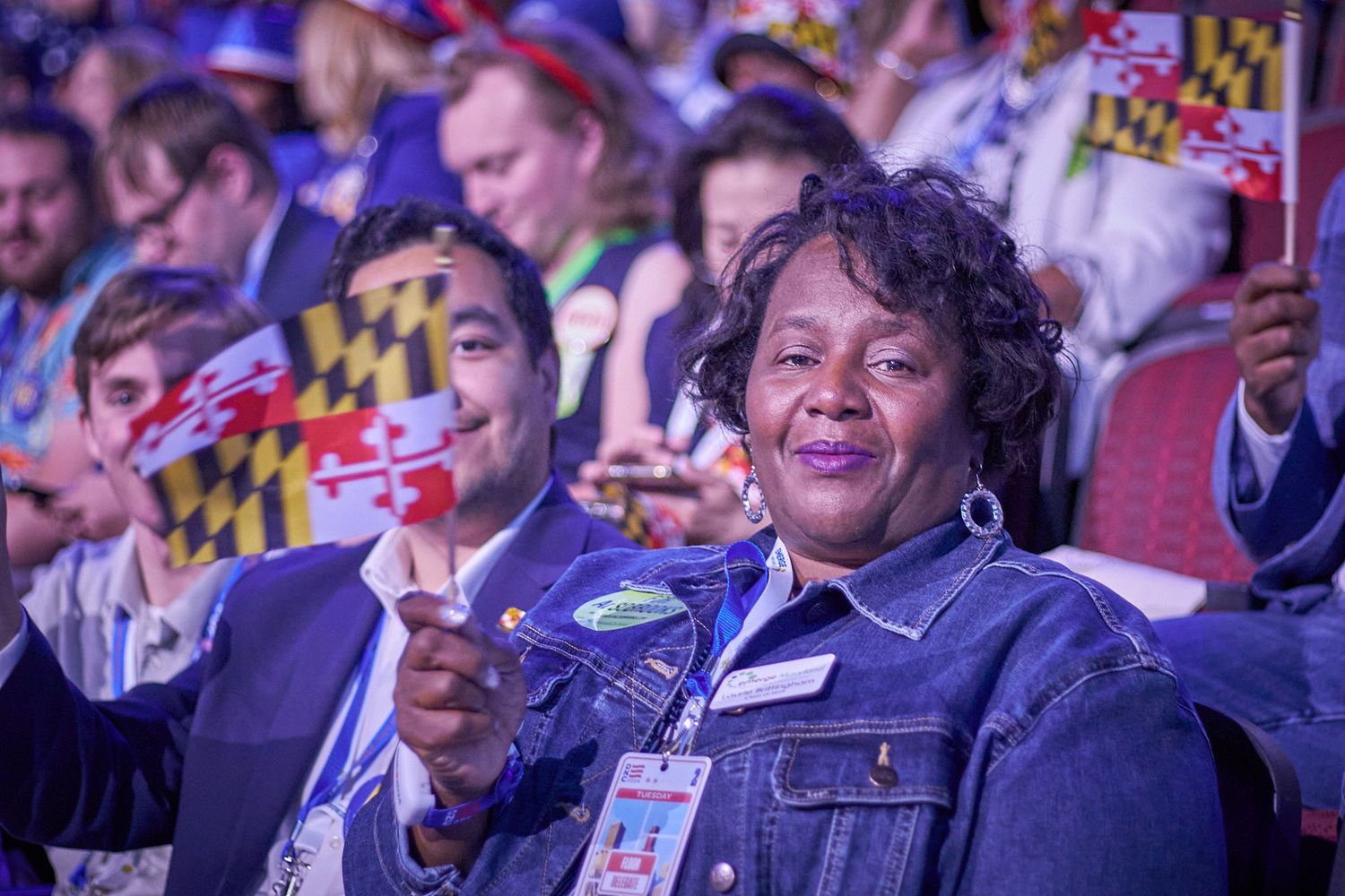 Lady waving Maryland flag at 2020 DNC