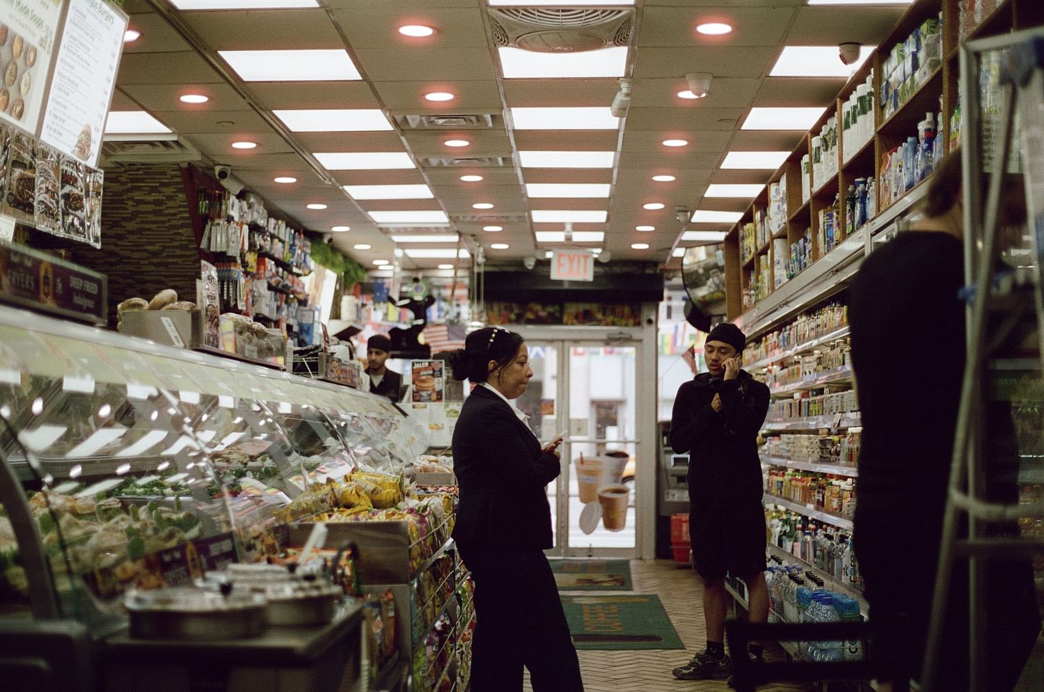 Inside a bustling convenience store in nyc.