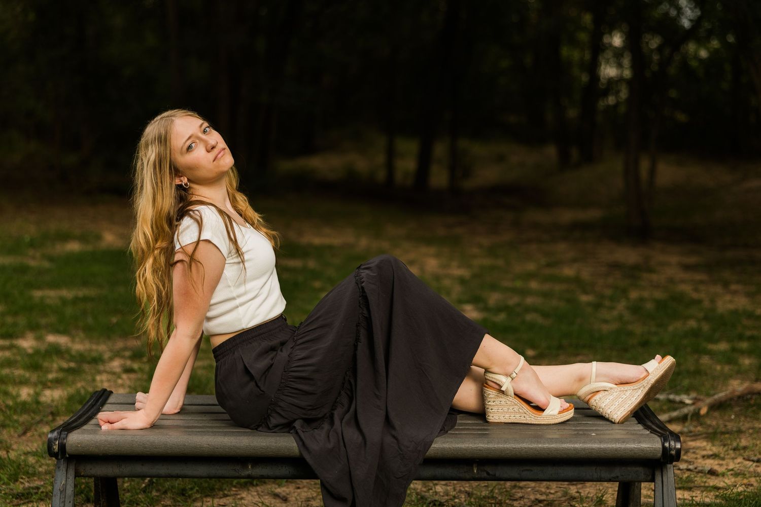 senior model on bench posing