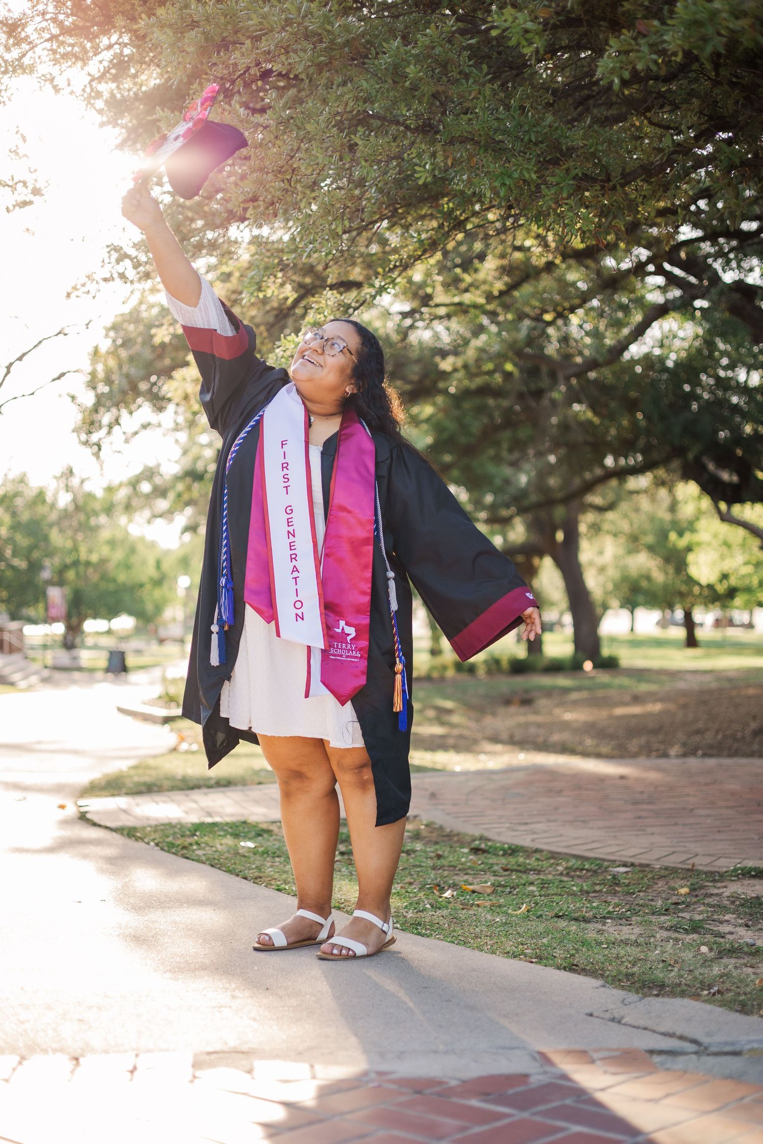 girl throwing her senior cap