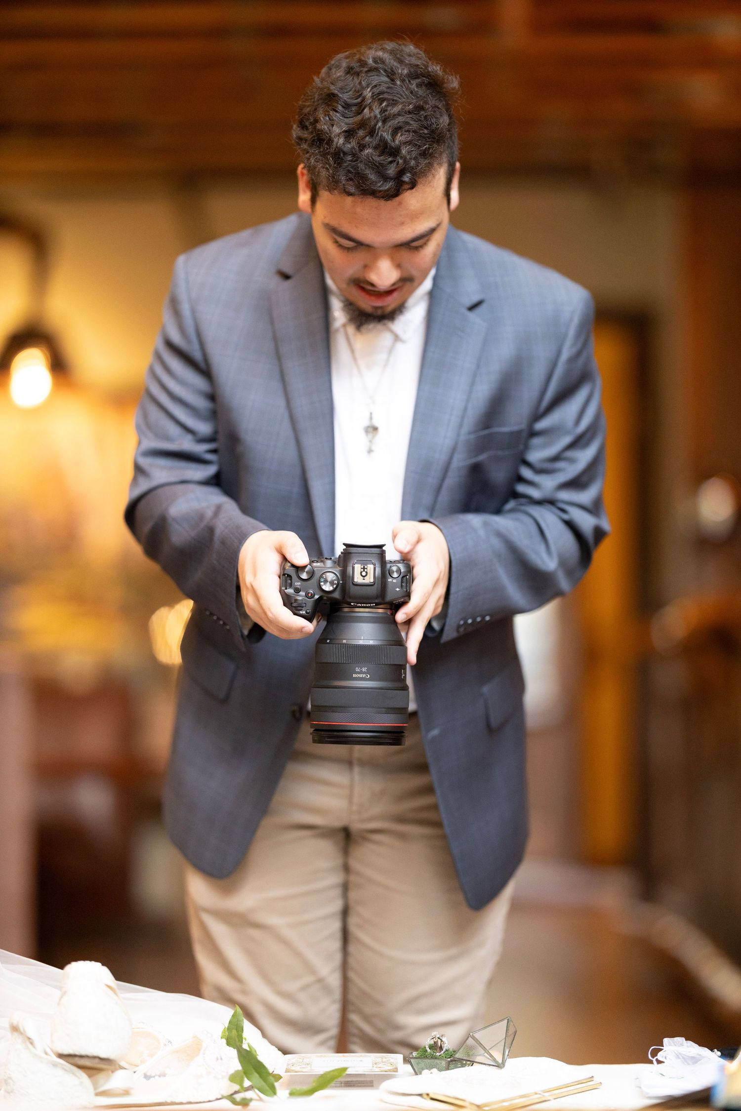 Esteban Gonzalez man photographing with camera