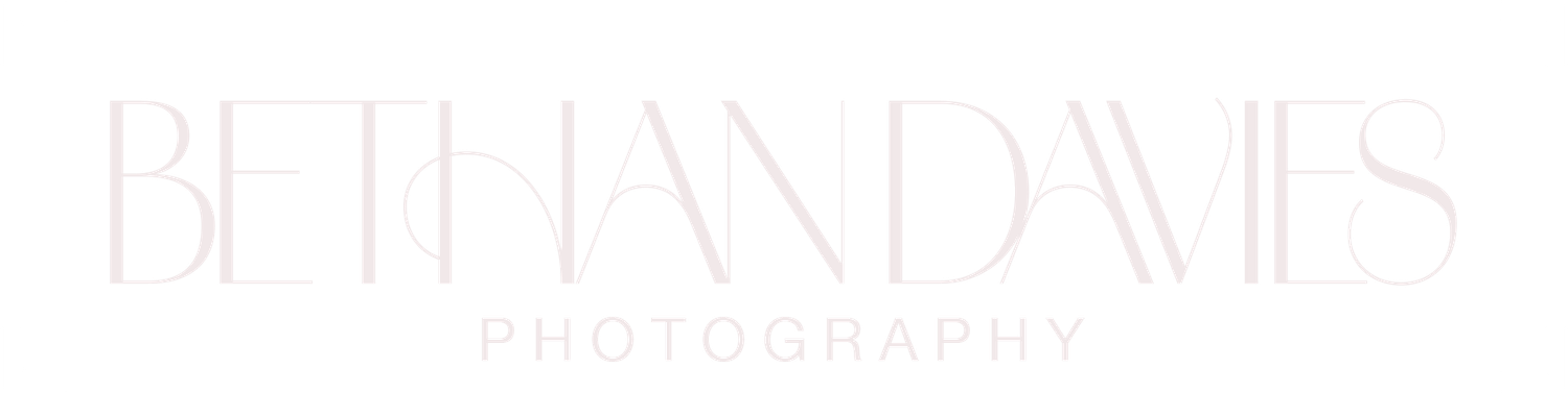 Bethan Davies Photography logo in elegant thin white serif font on a transparent background.