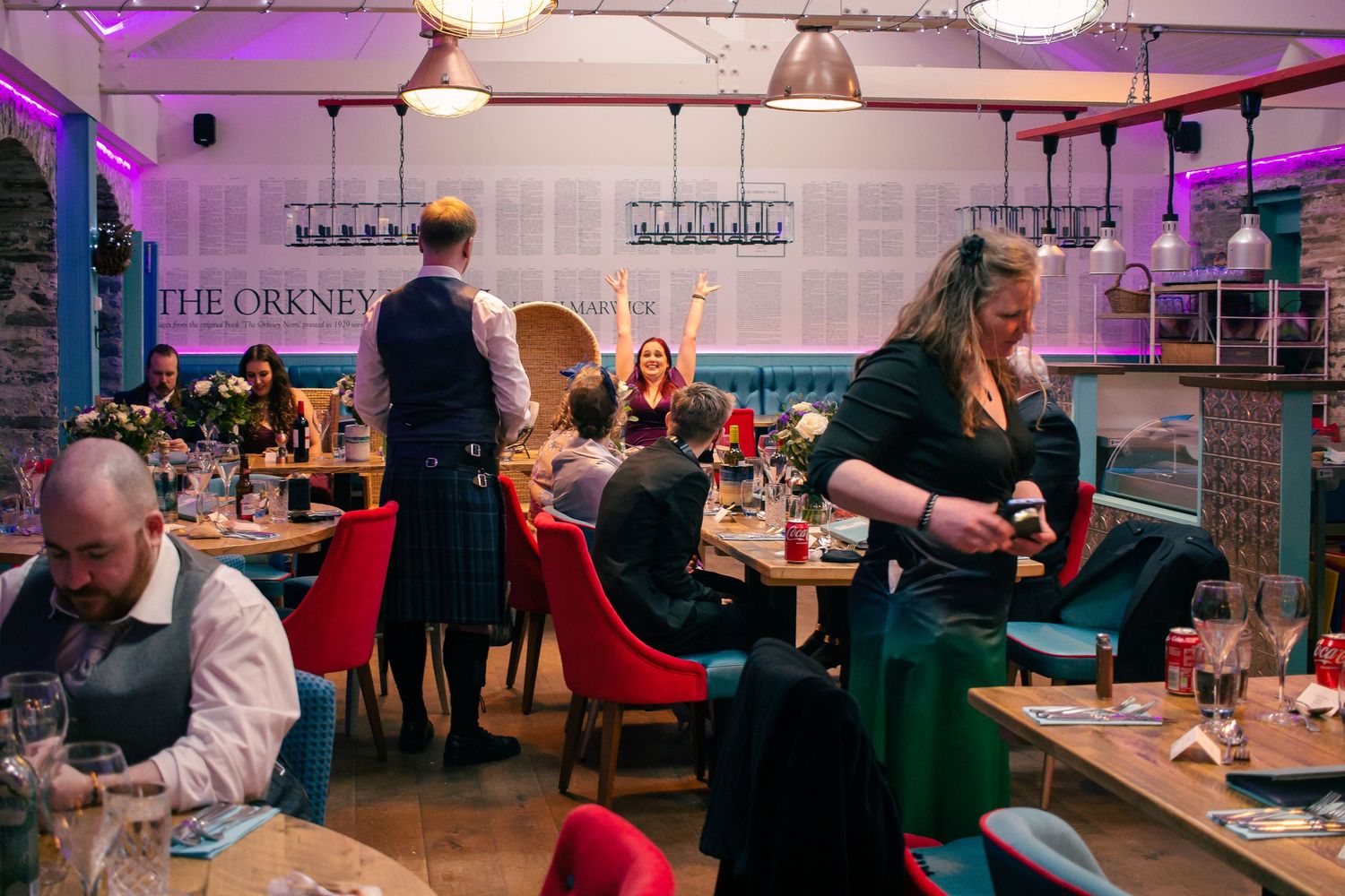 Wedding celebrations at at the storehouse, kirkwall, woman cheering in speeches.