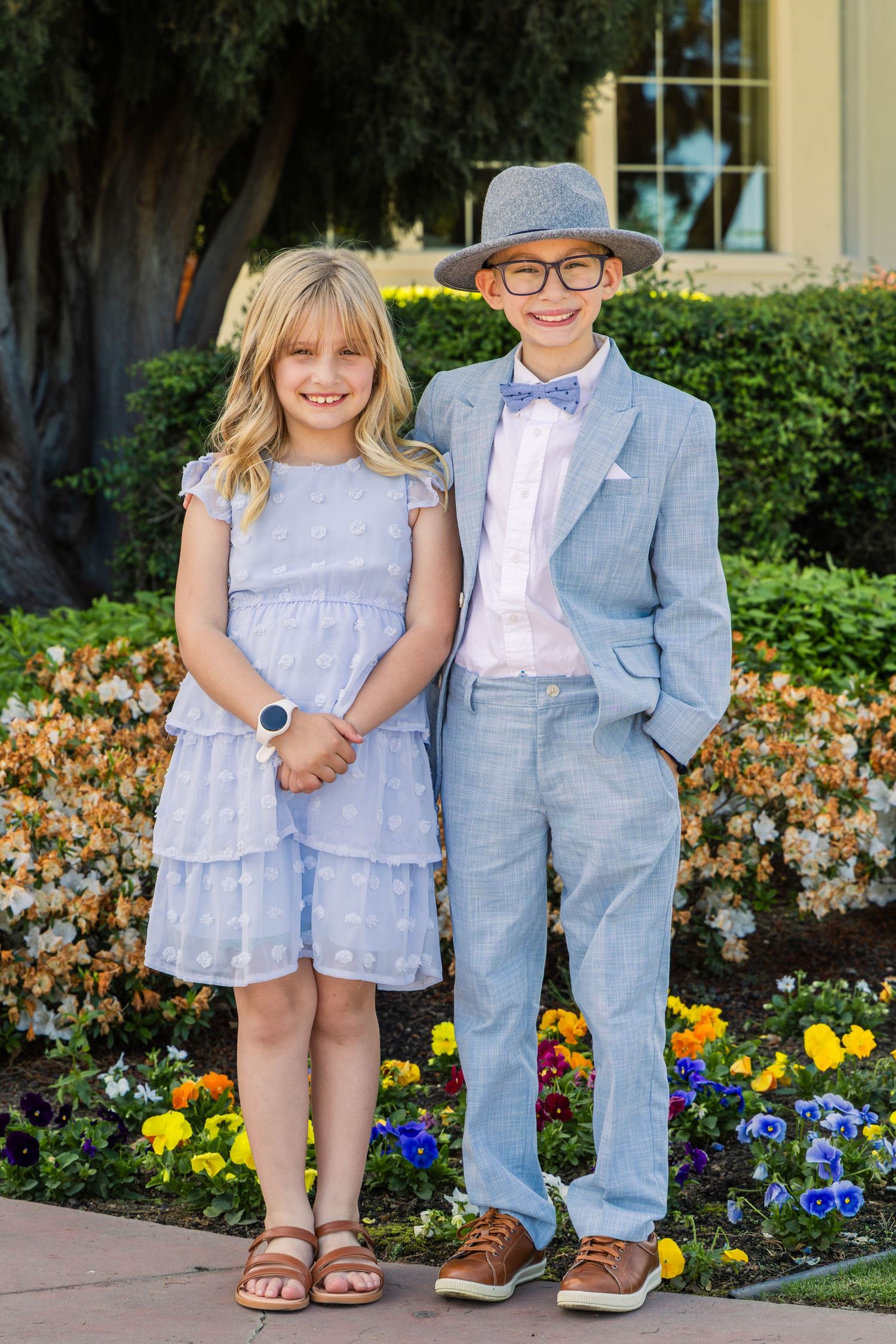 Young kids posing for family portraits
