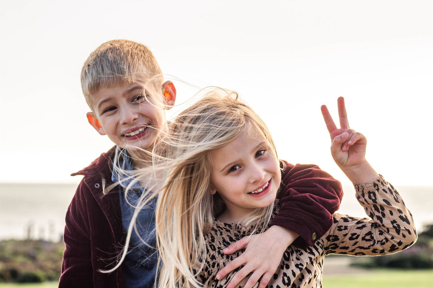 Kids posing during playtime at the beach