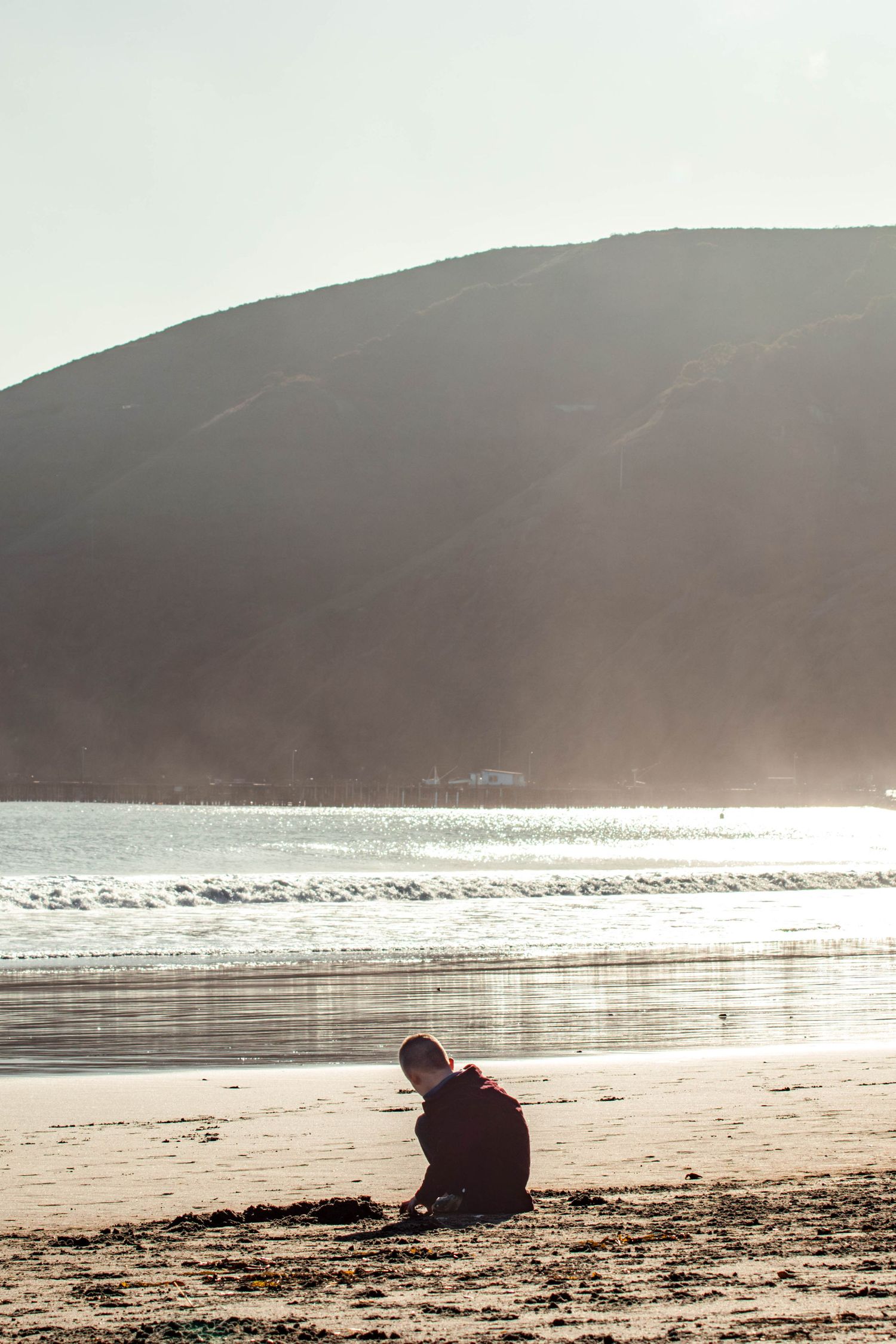 Young boy playing in the sand