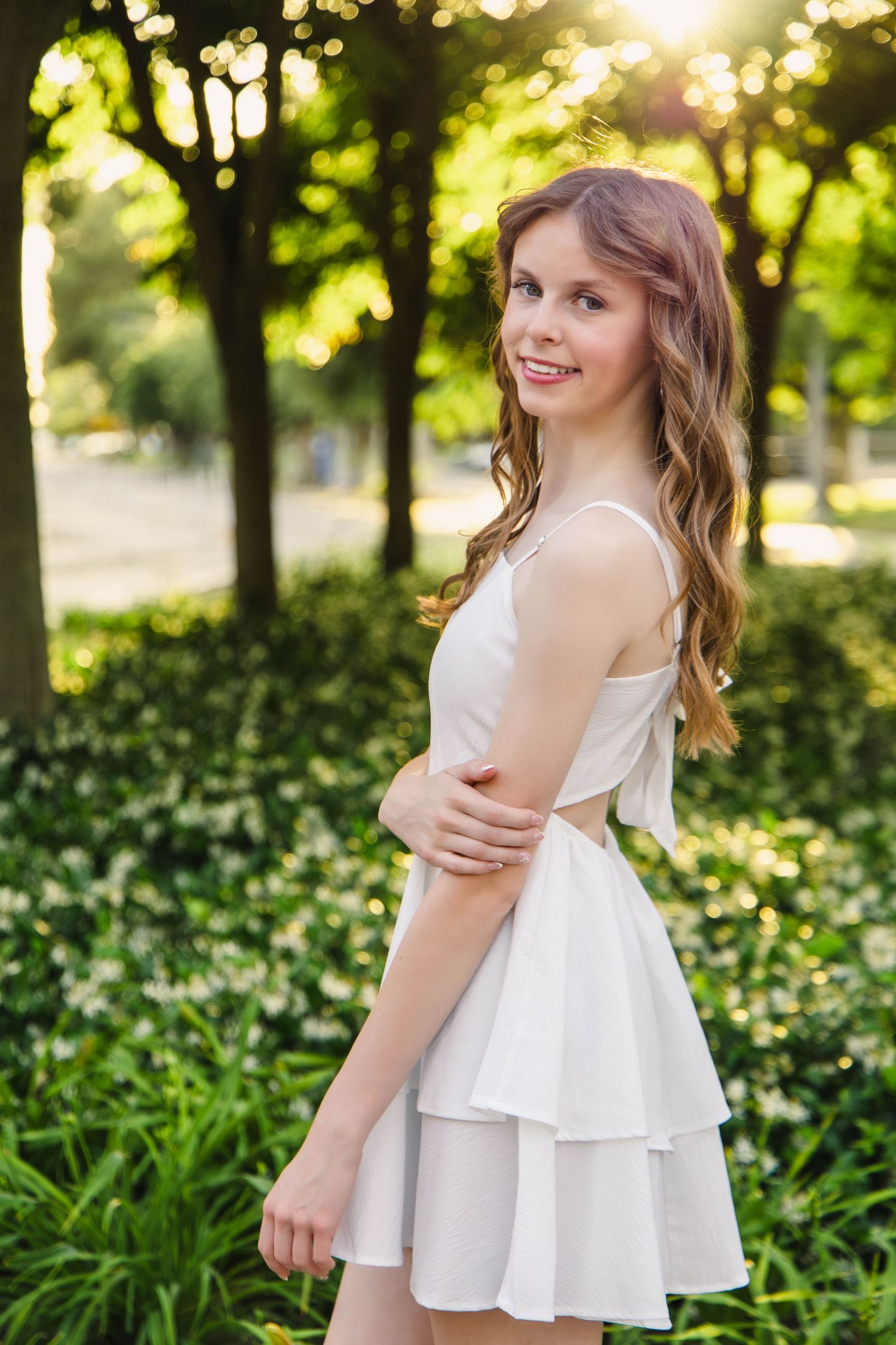 Senior portrait of graduate at golden hour