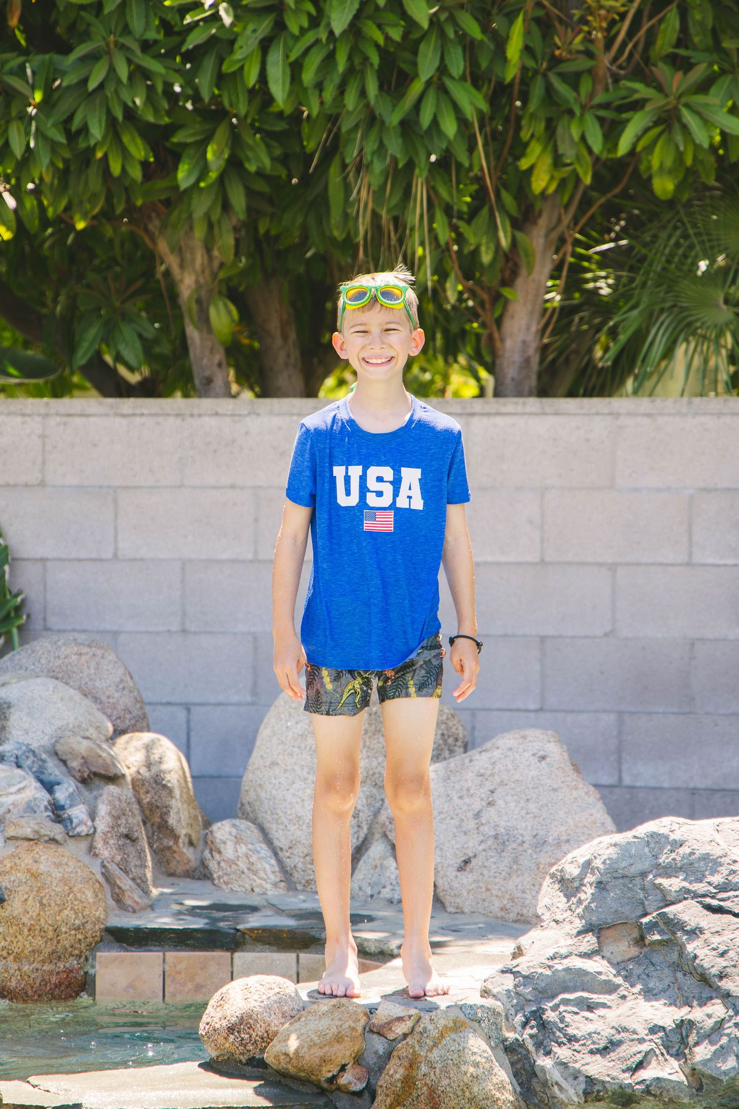 Boy swimming at birthday party