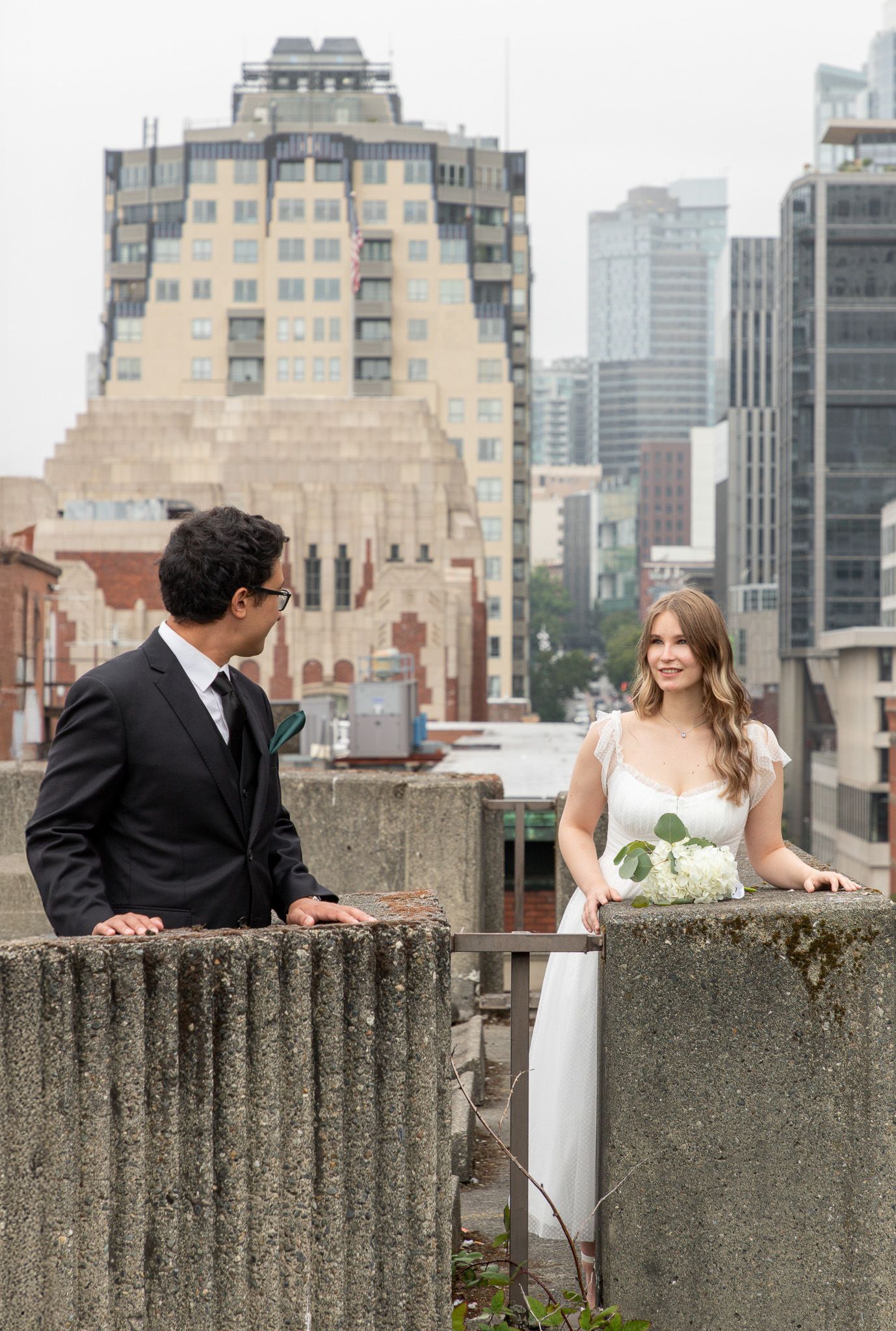 City elopement photoshoot in downtown Seattle, courthouse wedding followed by couple’s portraits on urban streets and sidewalks