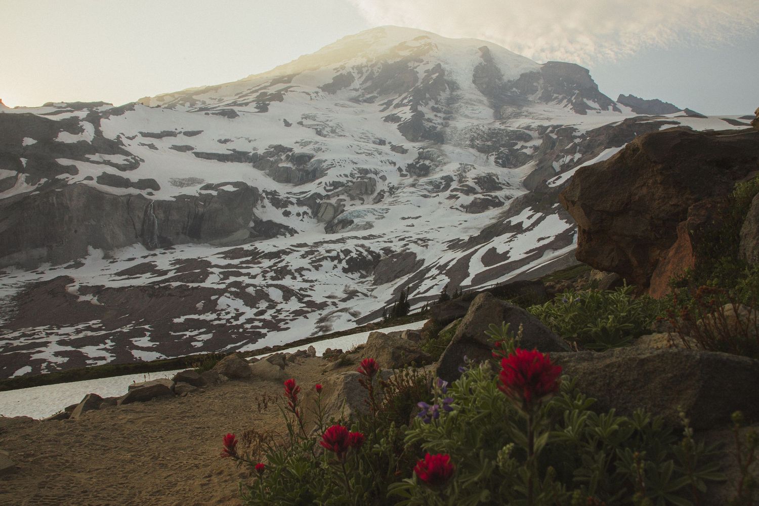 Snowy Mount Rainier peak with dramatic sky, Washington elopement scenery