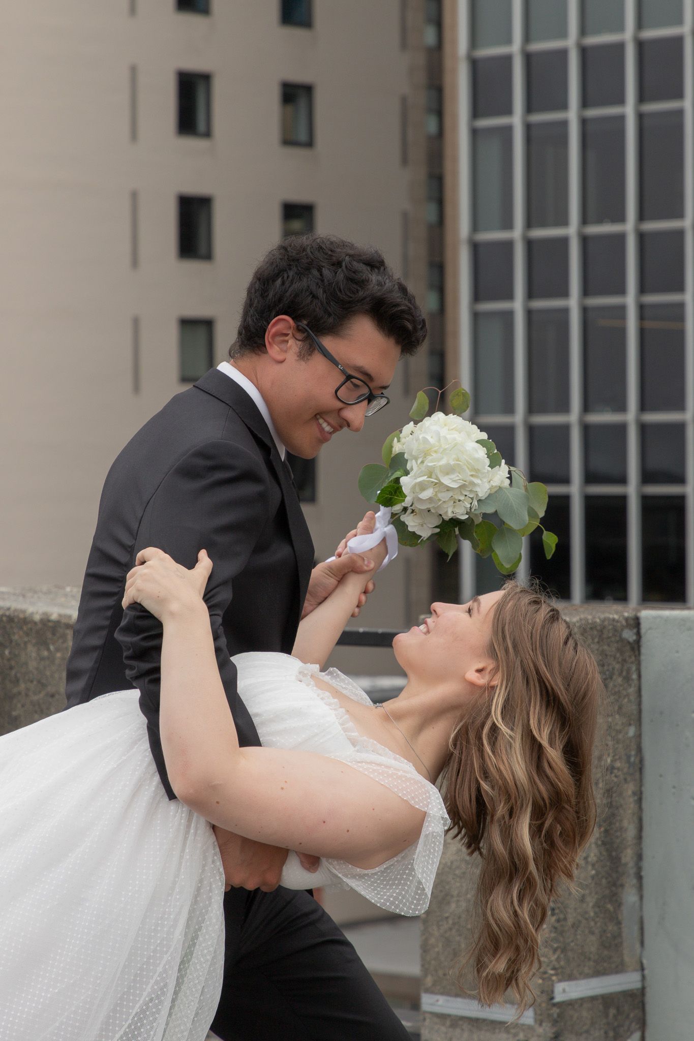 City elopement photoshoot in downtown Seattle, courthouse wedding followed by couple’s portraits on urban streets and sidewalks